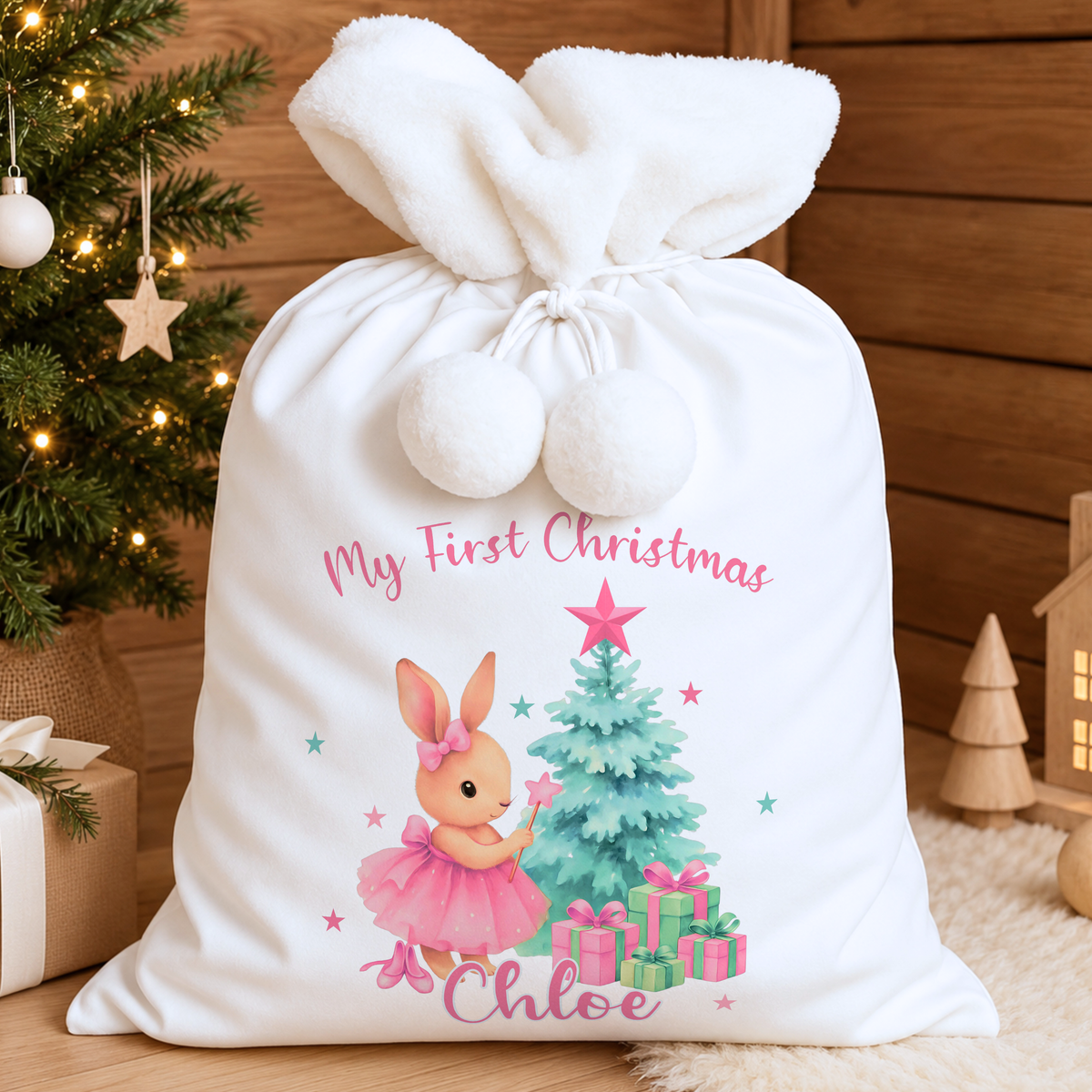 Personalised Christmas Sack and stocking for baby girl’s first Christmas, featuring a sweet bunny design and custom name for a magical Christmas keepsake.