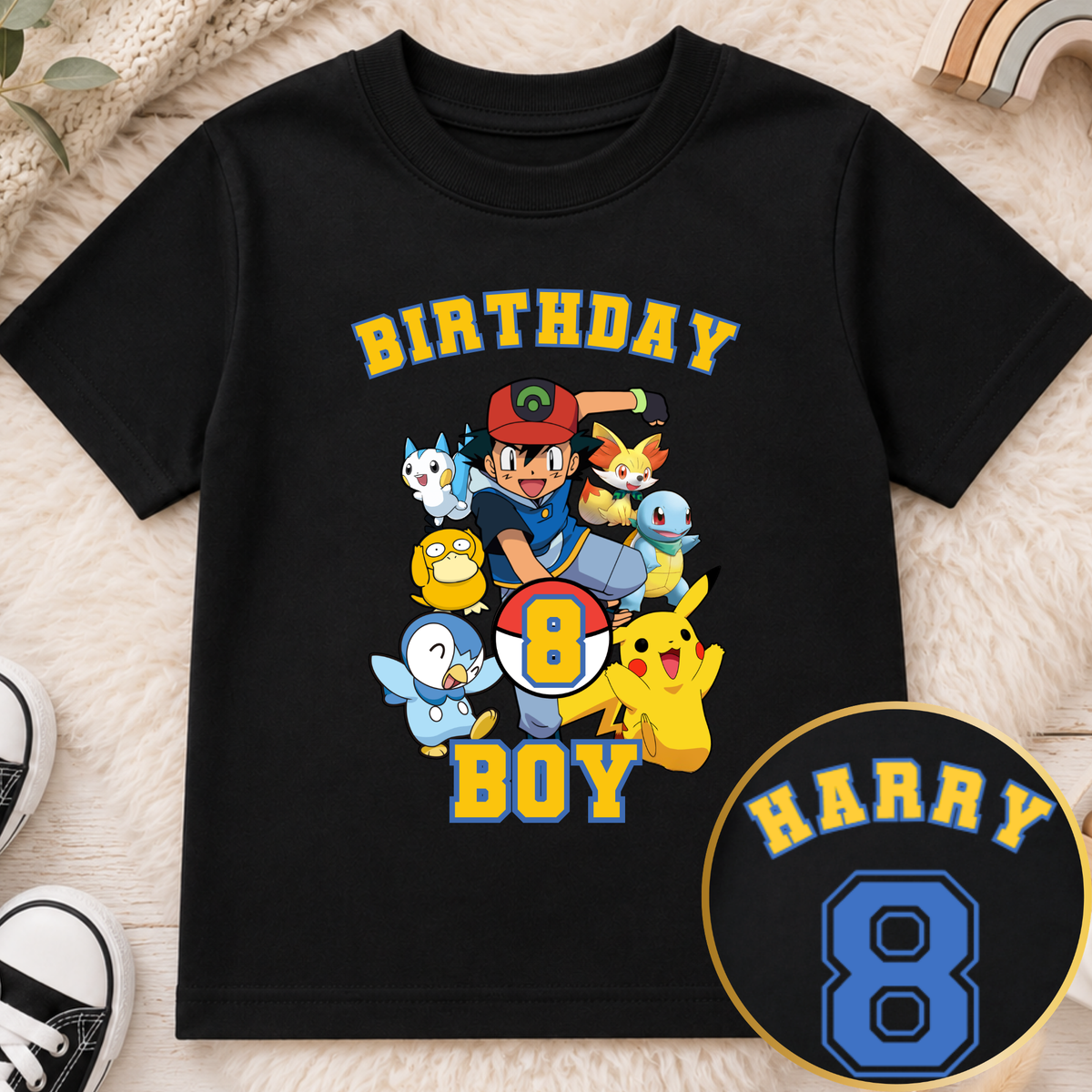 Personalised Pokémon Birthday T-Shirt for Boys, white gamer birthday top with colourful Pokemon characters, custom name and large birthday age on back.