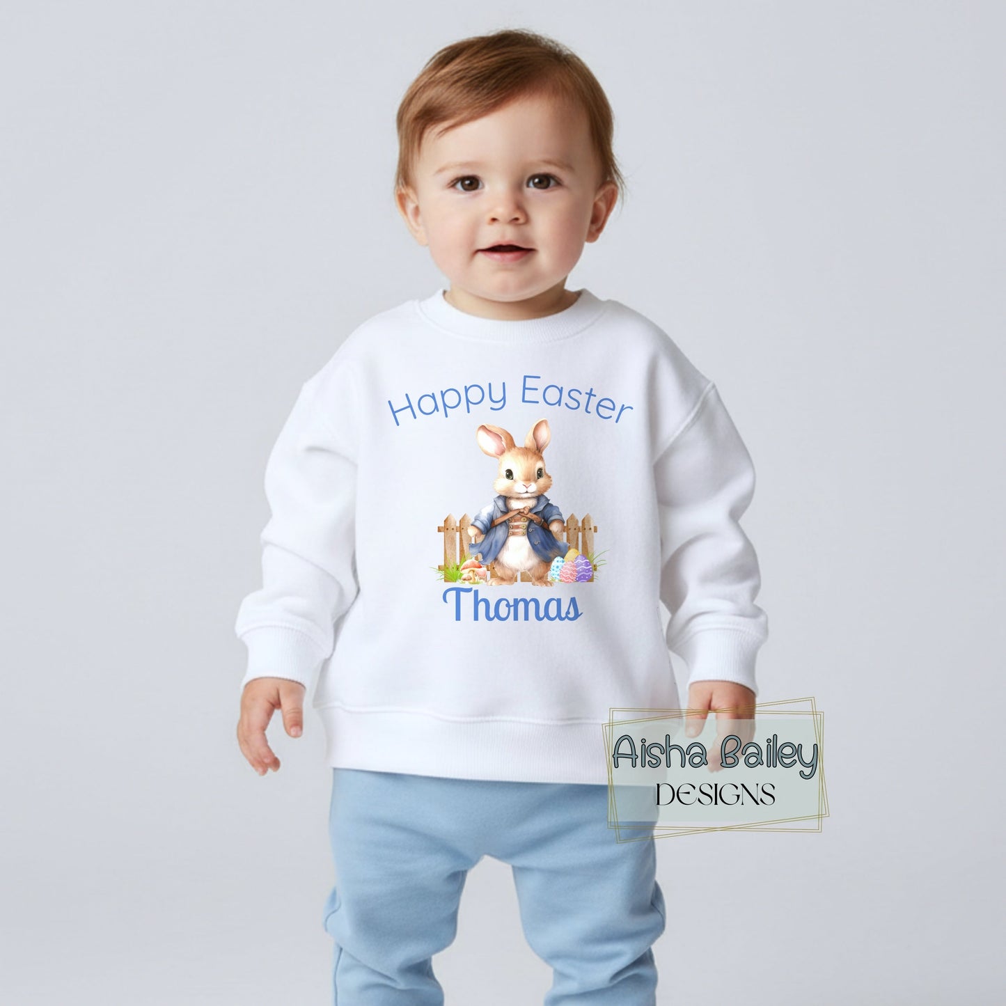 Personalised Easter top for boys with white rabbit bunny design and custom name, available as sweatshirt or t-shirt