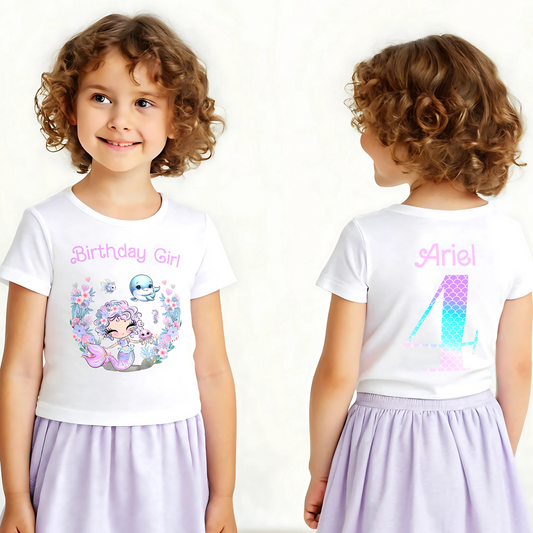Mermaid Birthday T-shirt for Girls with personalisation: A vibrant and magical T-shirt designed for a girl's birthday celebration, featuring a glitter-like mermaid print on both the front and back. The shirt can be personalised with the birthday girl's name for a special touch: Personalized, Girls, Glitter-like, Mermaid, Birthday, T-shirt, Front and Back Print, Girls mermaid birthday gift