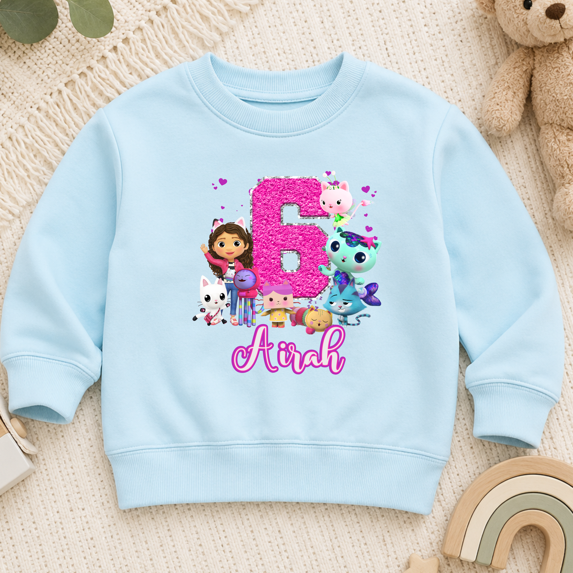 Personalised Gabby's Dollhouse Birthday Sweatshirt for Girls: A custom name and age sweatshirt for a girl's birthday Gabby's Dollhouse themed