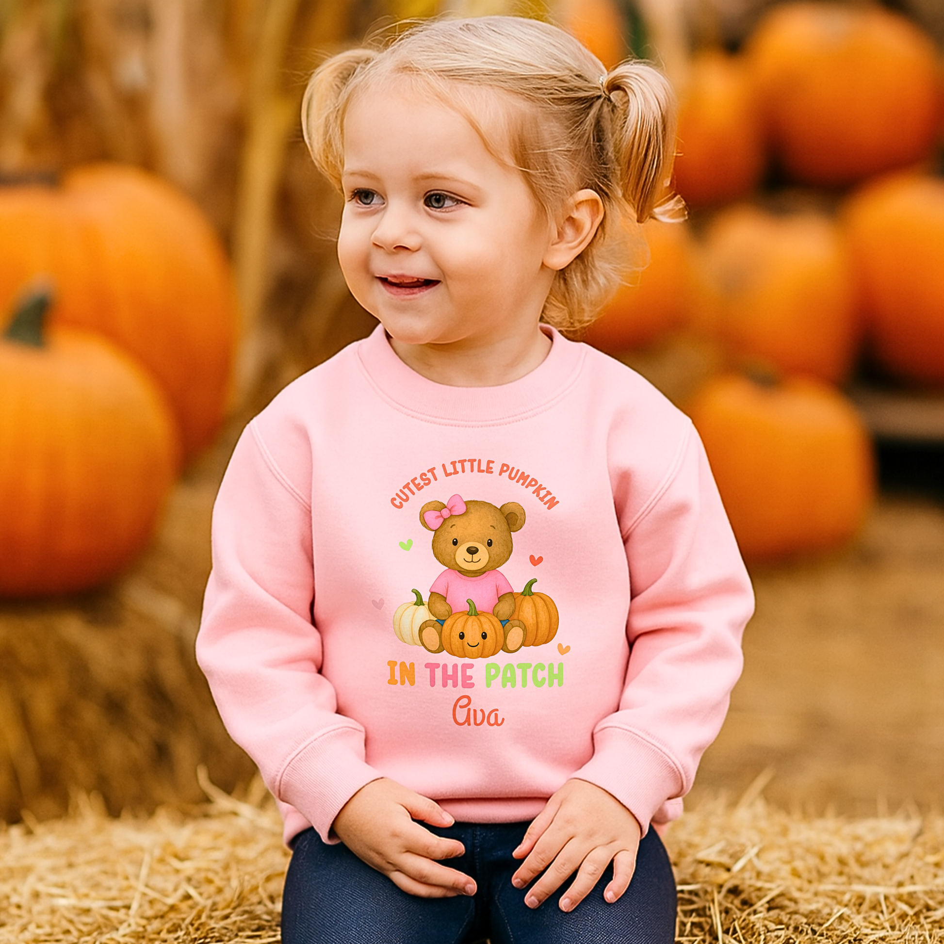 Personalised Halloween sweatshirt for kids with teddy bear and “Cutest Pumpkin in the Patch” design.