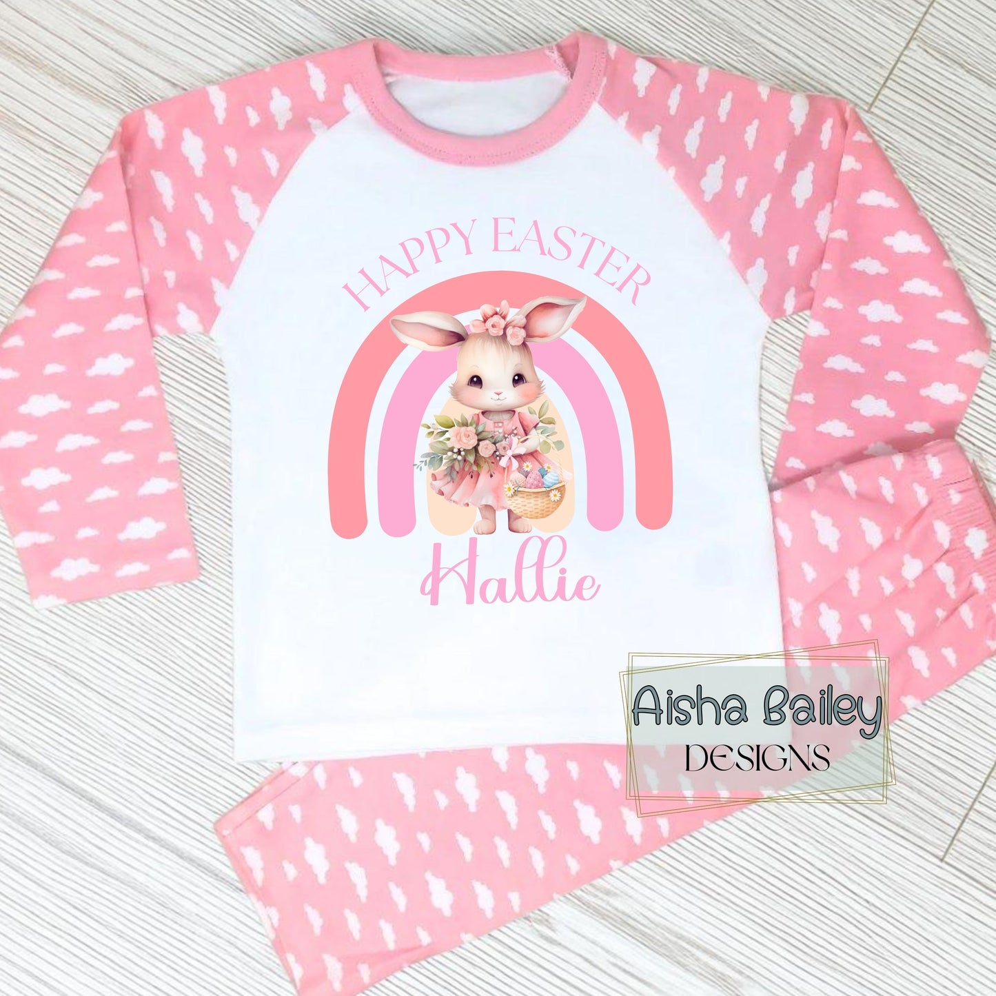 Personalised Easter Pyjamas for girls with their custom name. Bunny Rainbow design in soft pink pastel tones