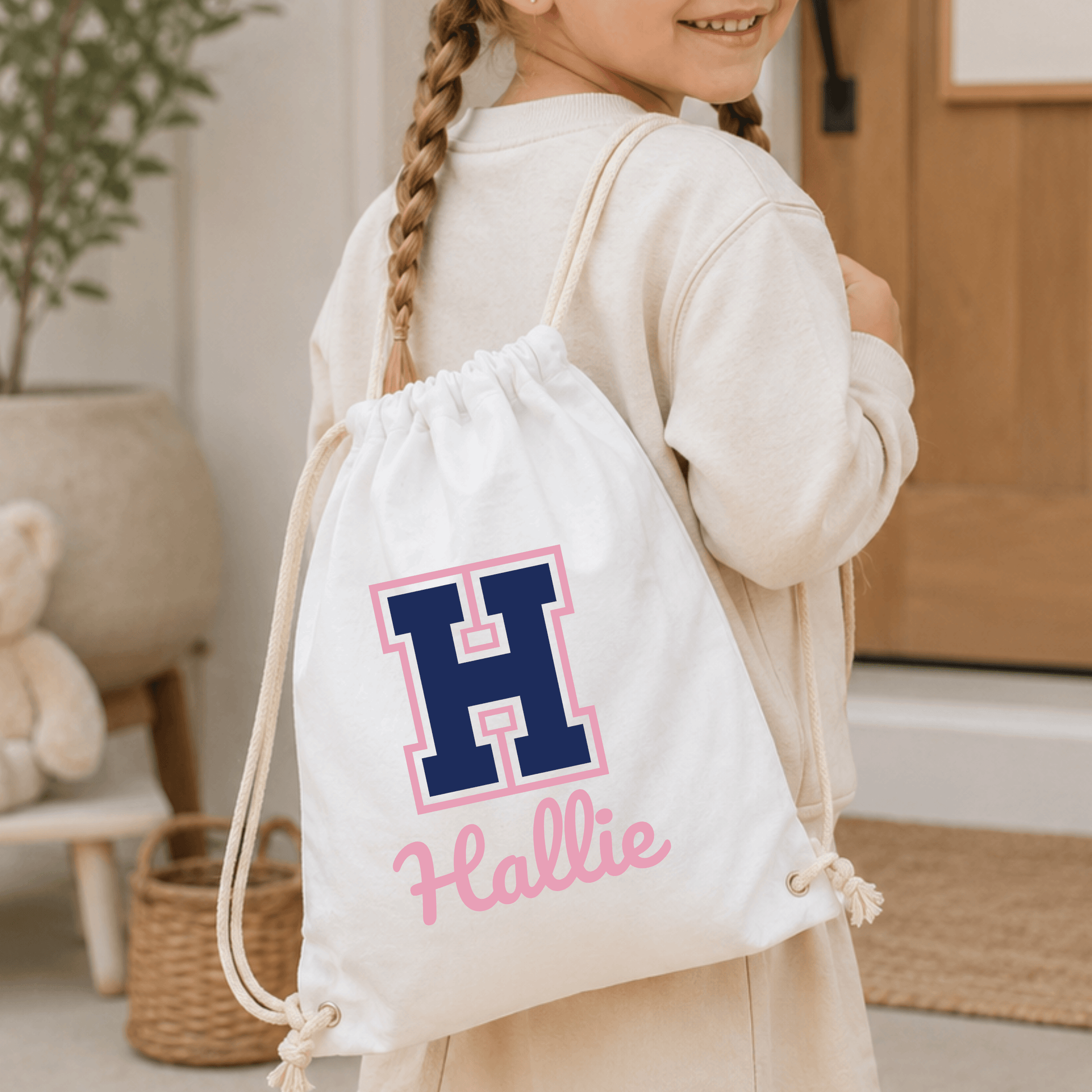 Personalised Varsity PE Drawstring Bag for girls with custom initial and name in a choice of bag colours.