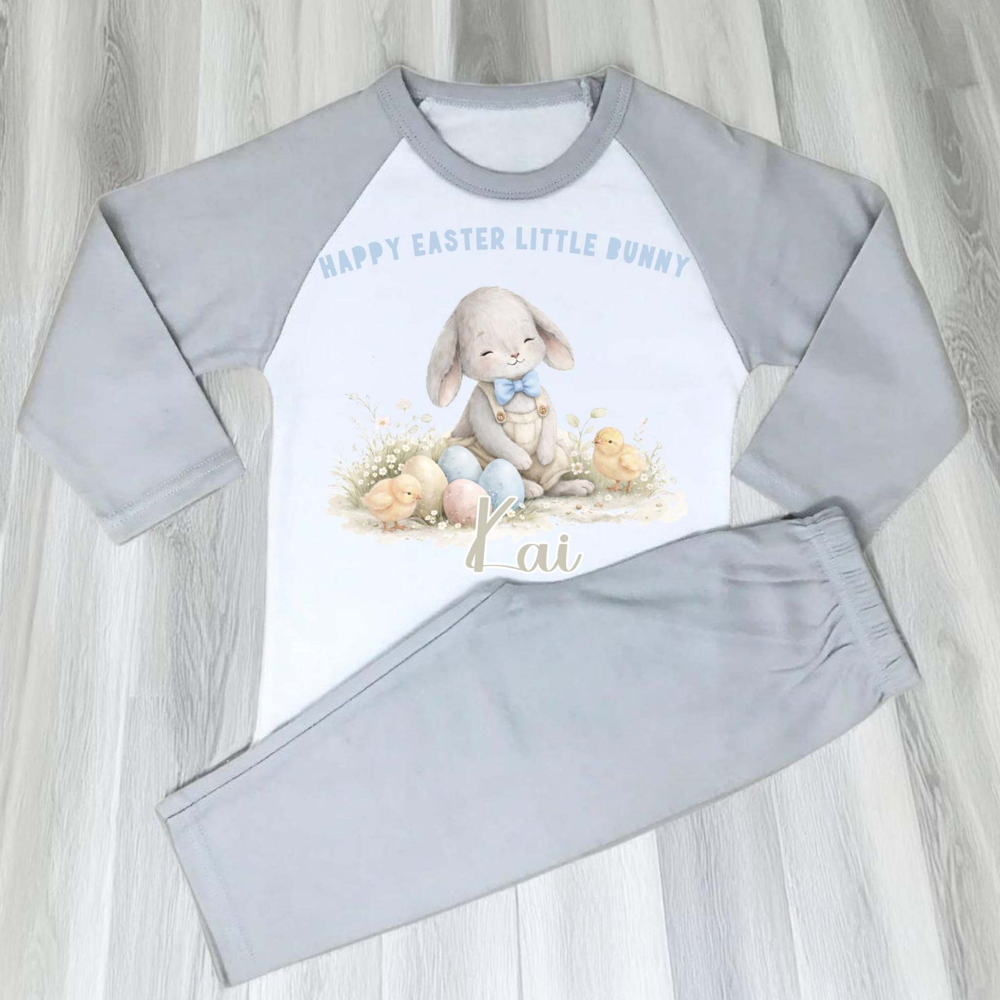 Personalised Easter Pyjamas: Boys Easter Pyjamas with personalised name featuring white bunny and pastel Easter egg design