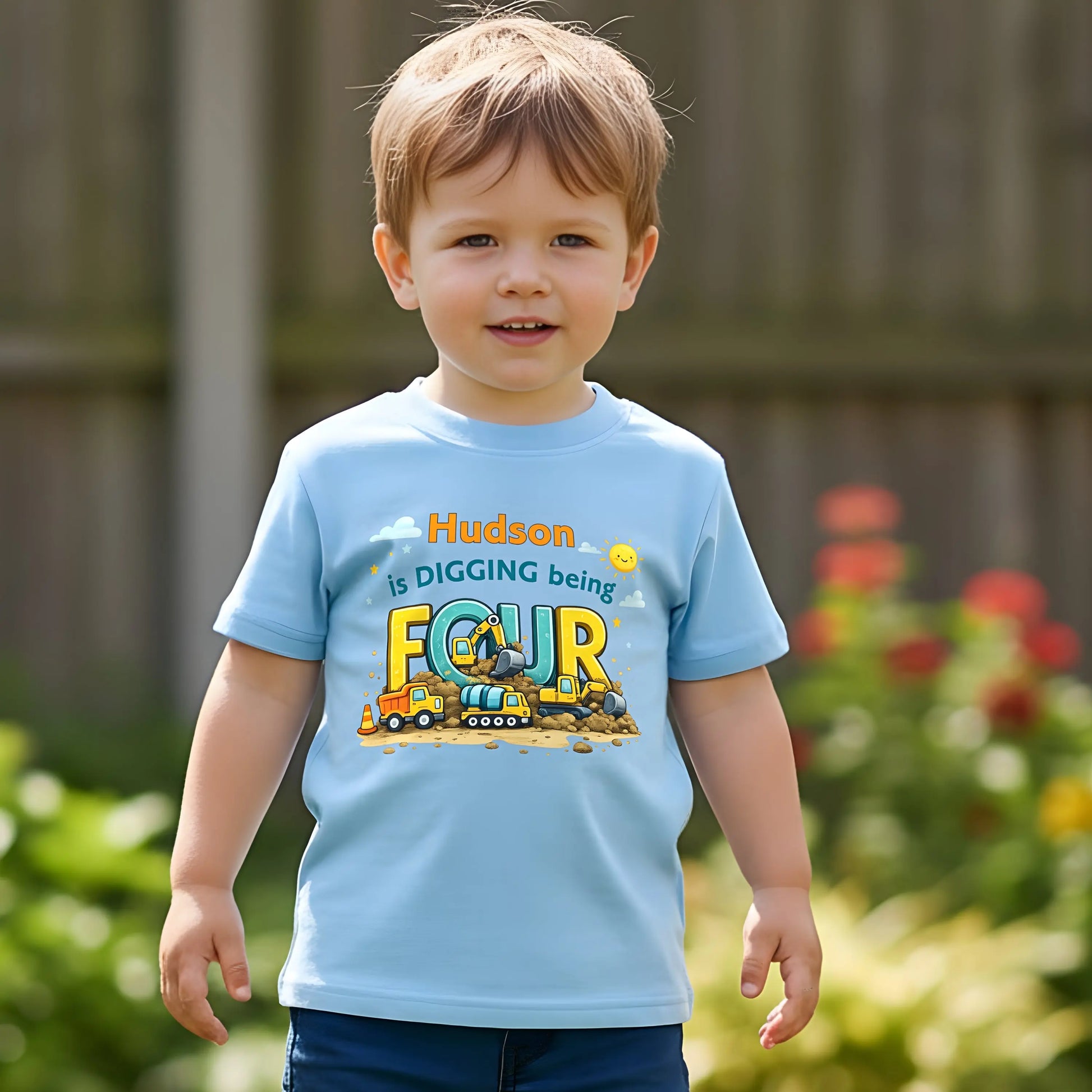 Digger birthday t-shirt personalised with child’s name and age, featuring colourful construction vehicles on a kids birthday shirt