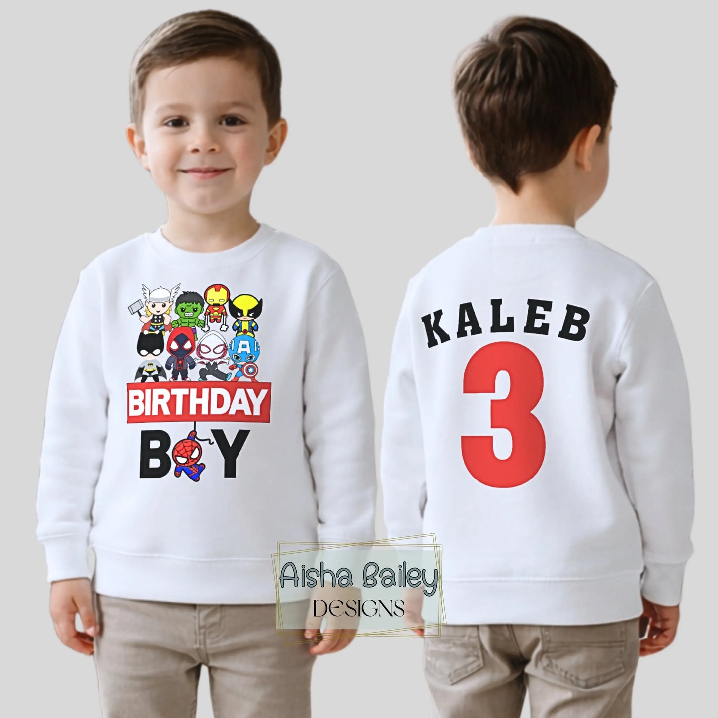 Personalised superhero birthday sweatshirt for kids with name and age on back, colourful superhero design on front, custom birthday outfit