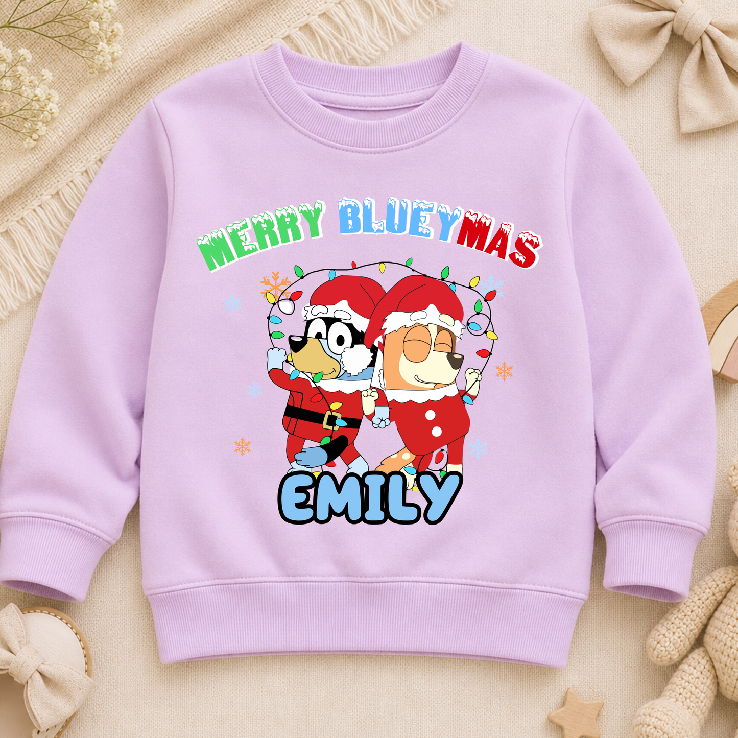 Personalised Christmas Jumper for kids featuring a festive Merry Blueymas design with Bluey and Bingo, personalised with your child's name.