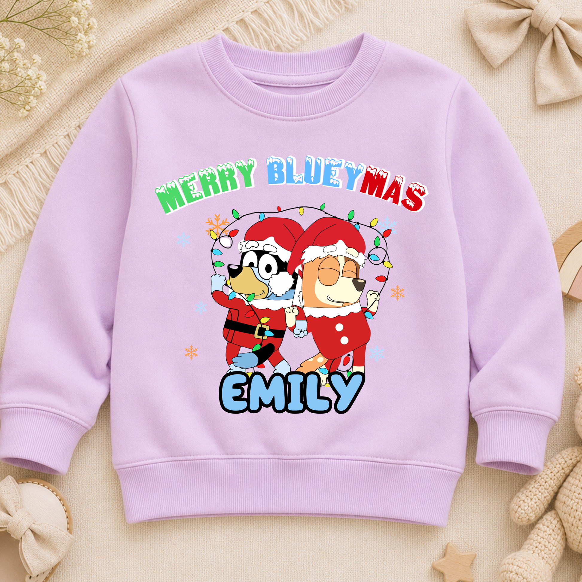 Personalised Christmas Jumper for kids featuring a festive Merry Blueymas design with Bluey and Bingo, personalised with your child's name.