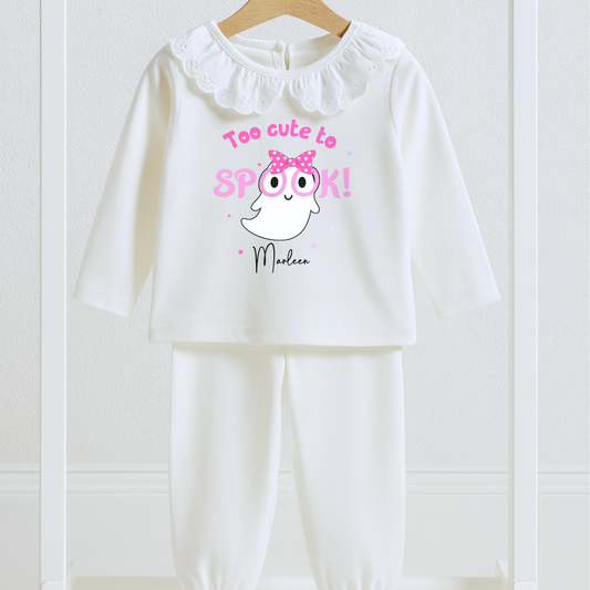 Personalised Halloween pyjamas for girls with “Too Cute to Spook” ghost design on white frill set.