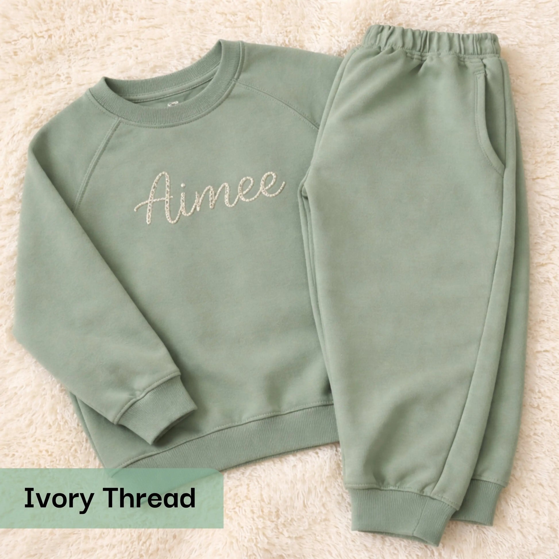 Personalised embroidered loungewear with a name: A child wearing a loungewear set with their name displayed on the front. Perfect for Christmas and birthday gifting
