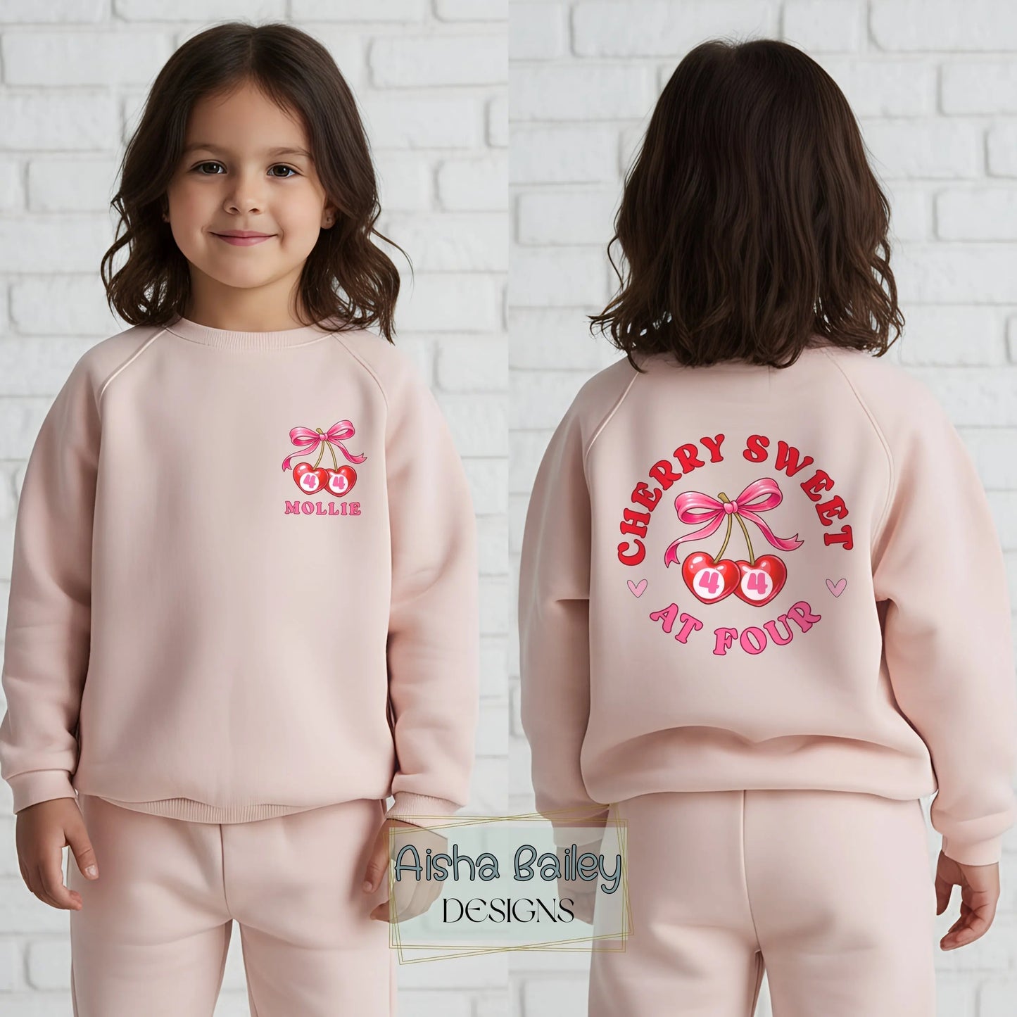 Personalised birthday loungewear set for girls with cherry and bow design, custom name and age print, soft sweatshirt and matching bottoms for birthday celebrations