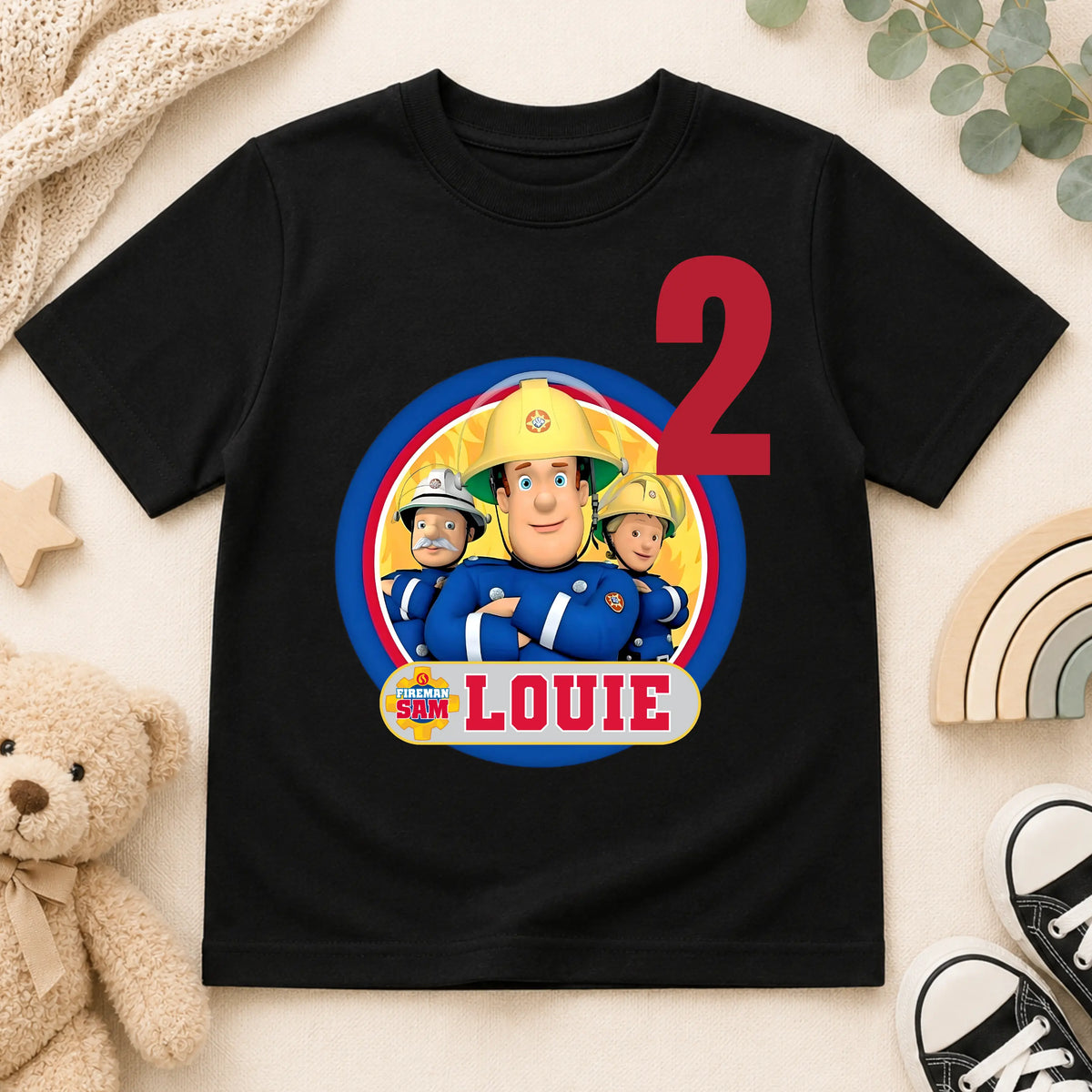 Personalised Fireman Sam birthday T-shirt for boys featuring a custom name and age with a colourful Fireman Sam-inspired design, perfect for birthday parties, cake smash photos and special celebrations.
