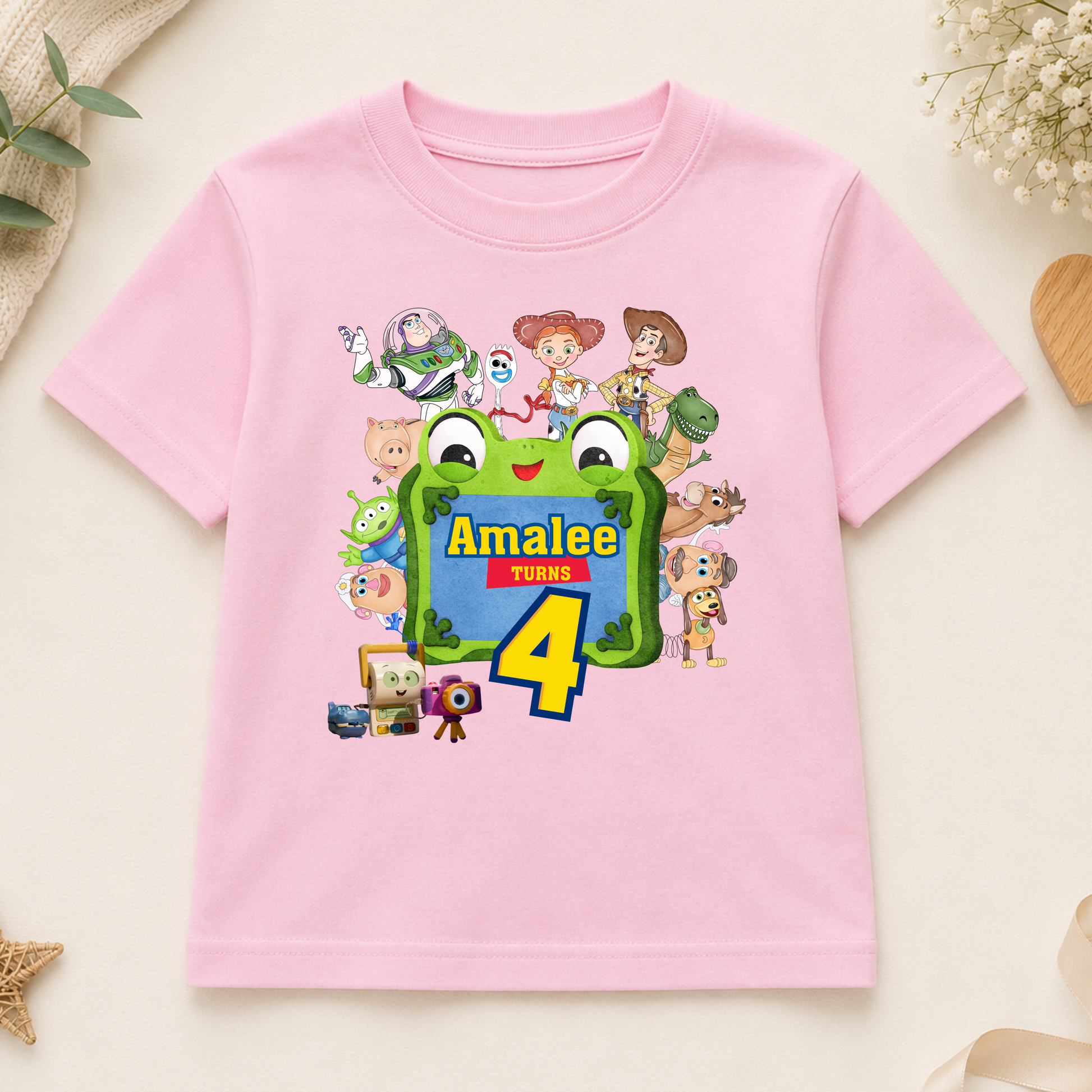 Personalised Toy Story 5 Birthday T-Shirt for Boys featuring a smiling boy and colorful characters.