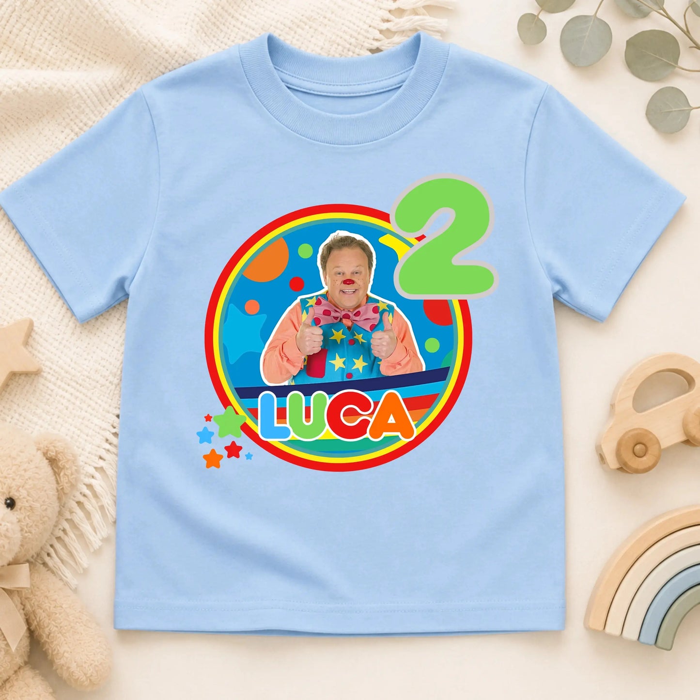 Personalised Mr Tumble birthday T-shirt for boys featuring a custom name and age with a colourful Mr Tumble-inspired design, perfect for birthday parties, cake smash photos, nursery celebrations and special birthday memories.