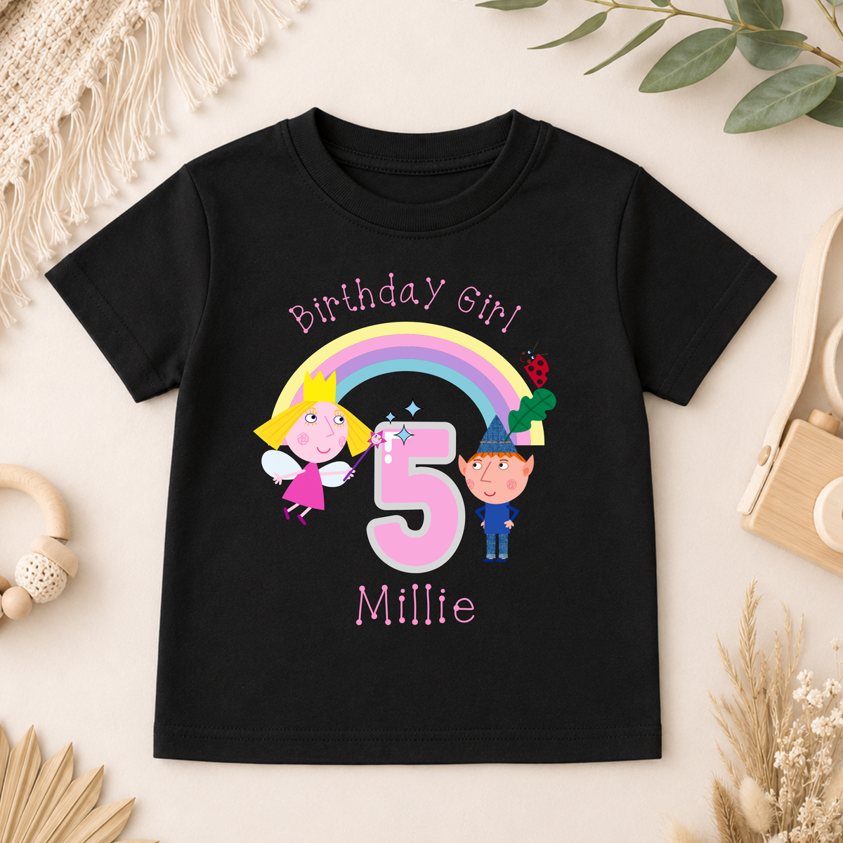 Personalised Ben and Holly Birthday T-Shirt for girls with name, age, rainbow, fairy and elf birthday design, available in pink, white and black.