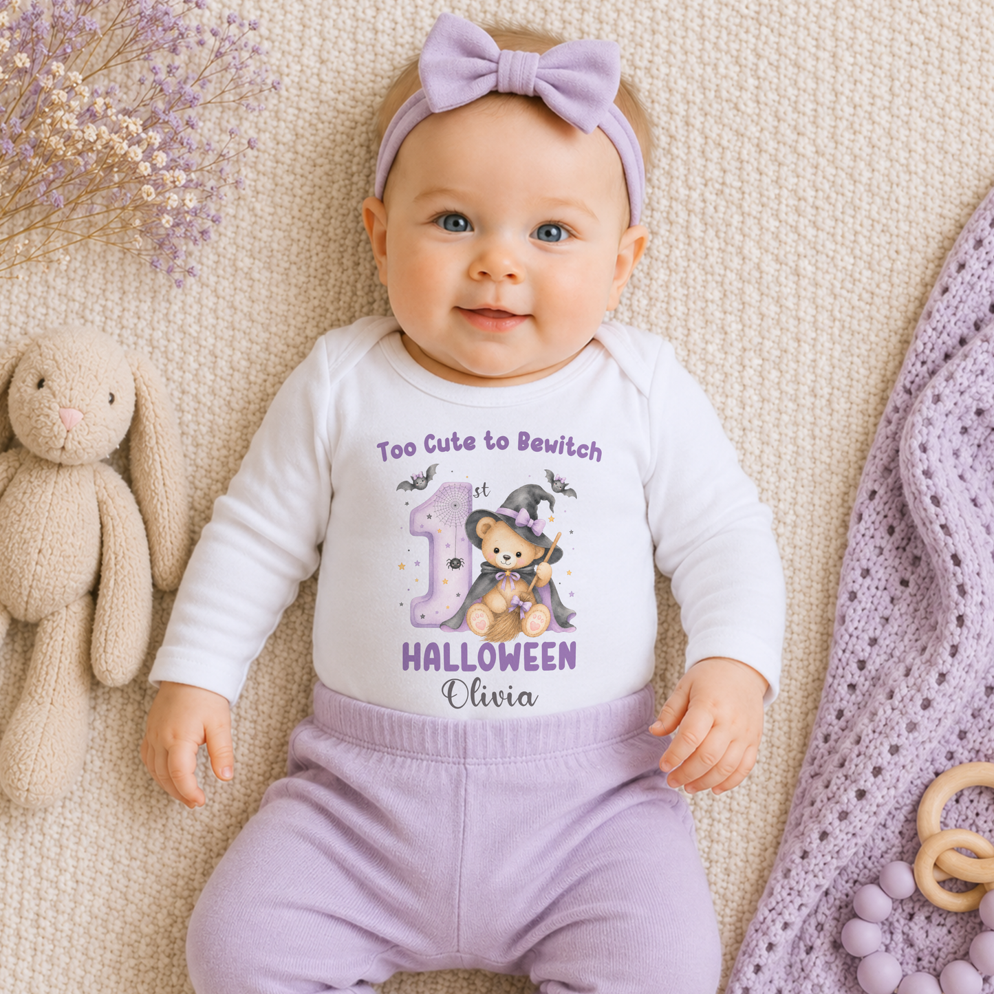 Personalised First Halloween Baby Outfit: Baby’s First Halloween personalised baby girl bodysuit with name, teddy bear witch, bats and first Halloween design.