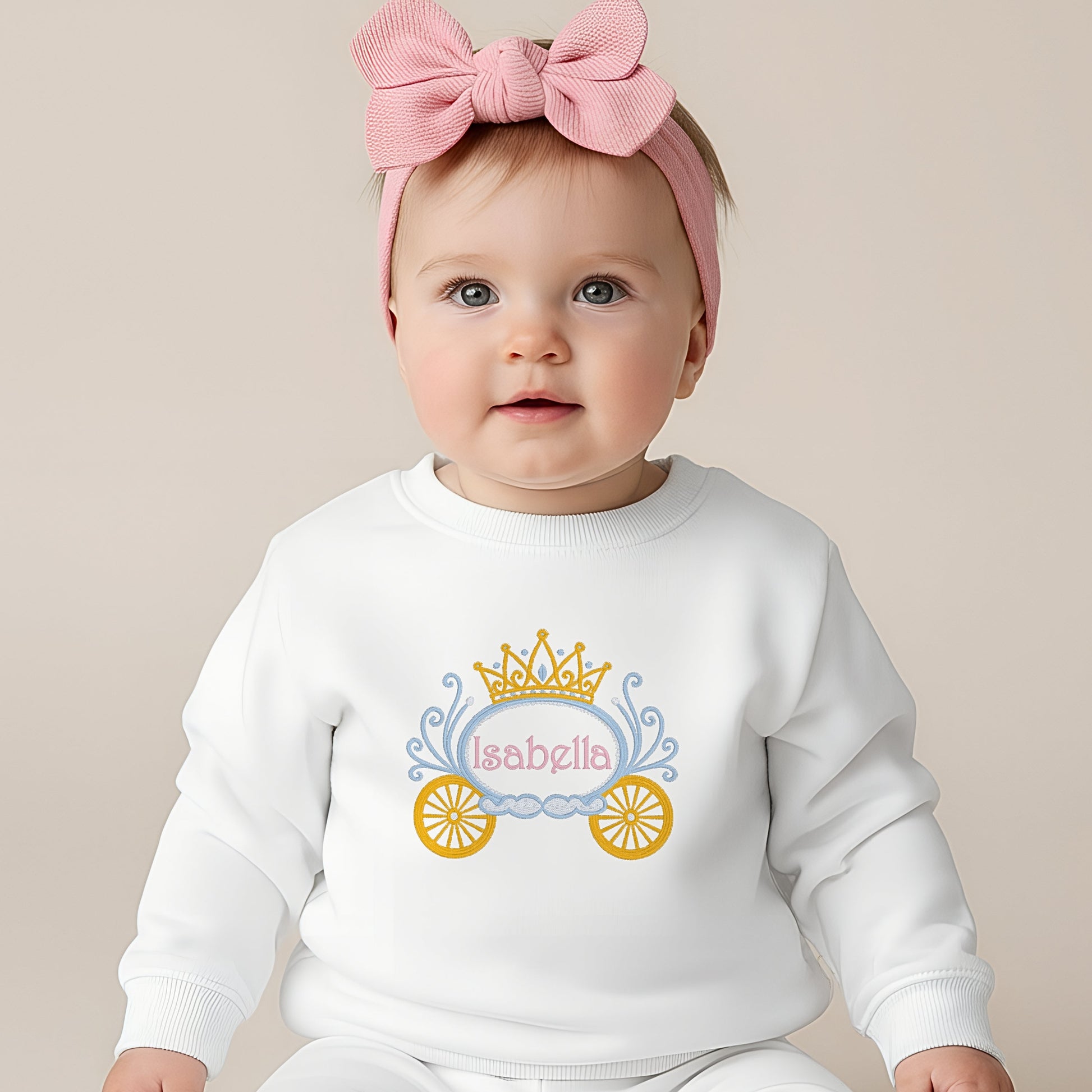 Princess Embroidered sweatshirt: Baby wearing a personalised embroidered princess carriage sweatshirt for girls made with premium threads and detailed stitching.