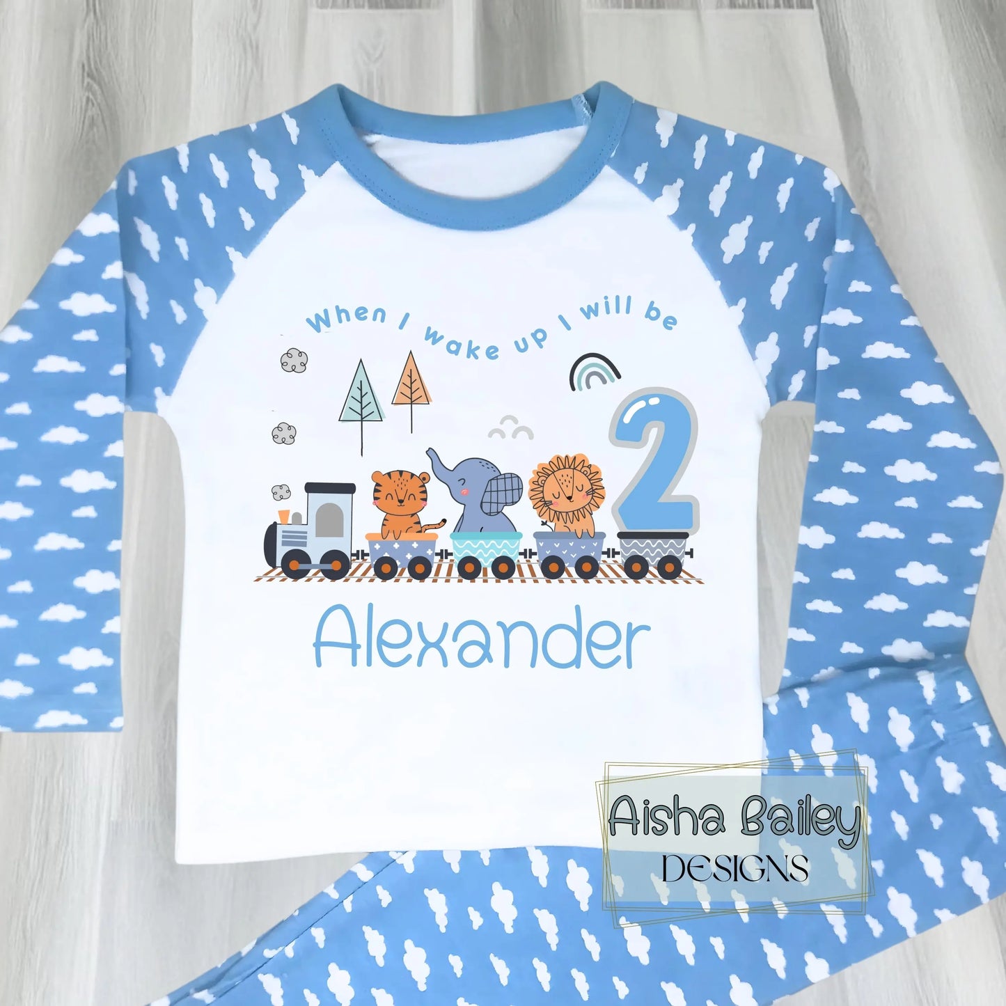 Personalised Safari birthday pyjamas with animal train design, custom name and age for boys