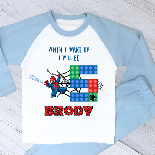 Personalised LEGO Spider-Man Birthday Pyjamas with child’s name and age, featuring a colourful superhero design for boys and girls aged 2–7.