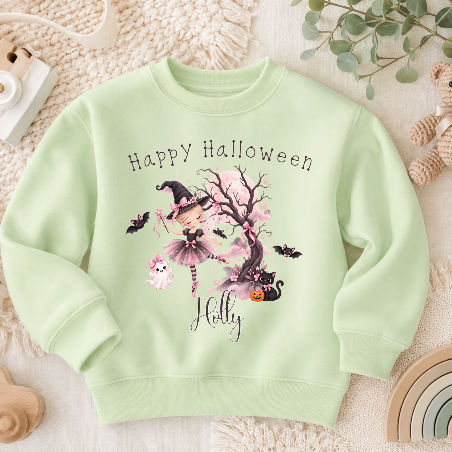 Personalised Halloween Sweatshirt for girls with witch ballerina, black cat, ghost, bats and child's name in pink Halloween design.