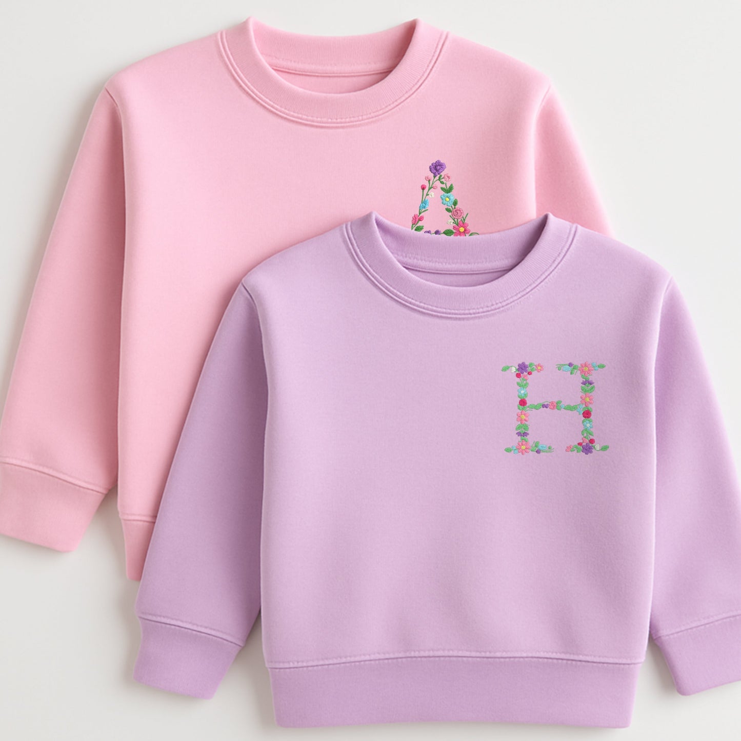 Floral initial embroidered sweatshirt: Floral initial girls sweatshirt featuring delicate embroidered flower letter design on soft kids jumper.