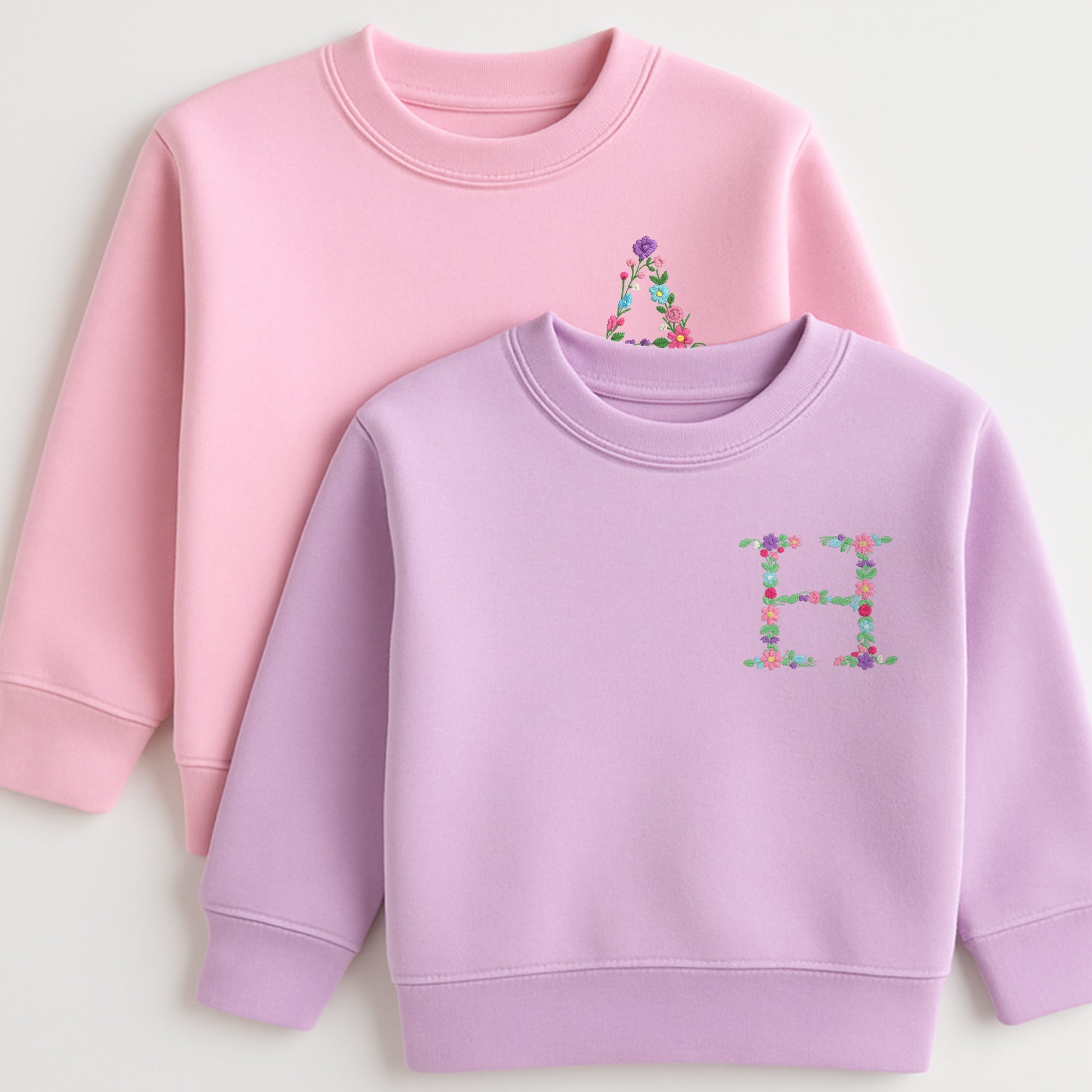 Floral initial embroidered sweatshirt: Floral initial girls sweatshirt featuring delicate embroidered flower letter design on soft kids jumper.