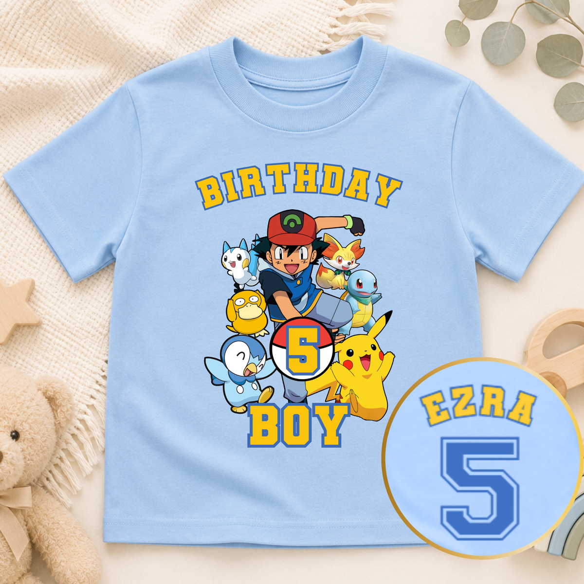 Personalised Pokémon Birthday T-Shirt for Boys, white gamer birthday top with colourful Pokemon characters, custom name and large birthday age on back.