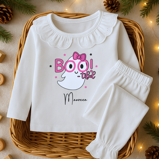Personalised Halloween pyjamas for girls with “Boo-tiful” ghost design on white frill set.