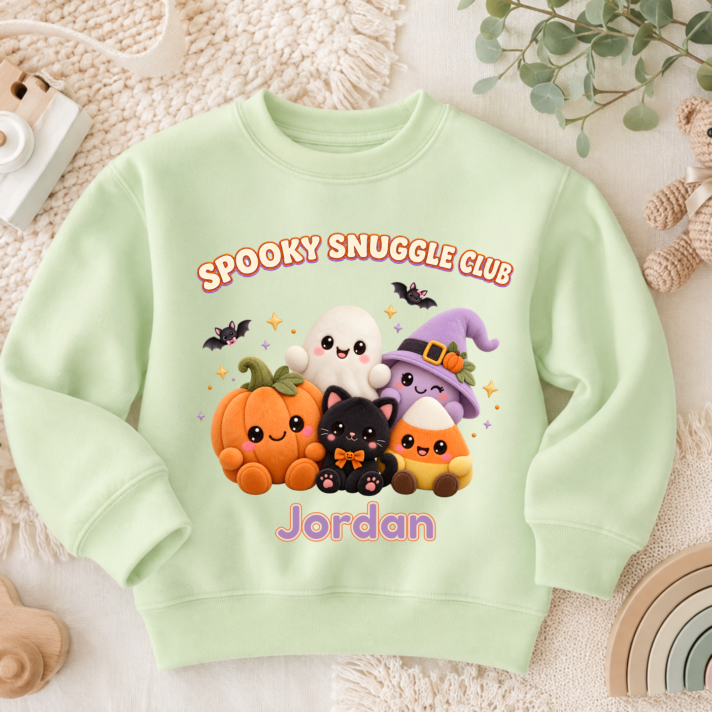 Personalised Halloween Sweatshirt for Kids with kawaii plush pumpkin, ghost, witch, black cat and candy corn Spooky Snuggle Club design.