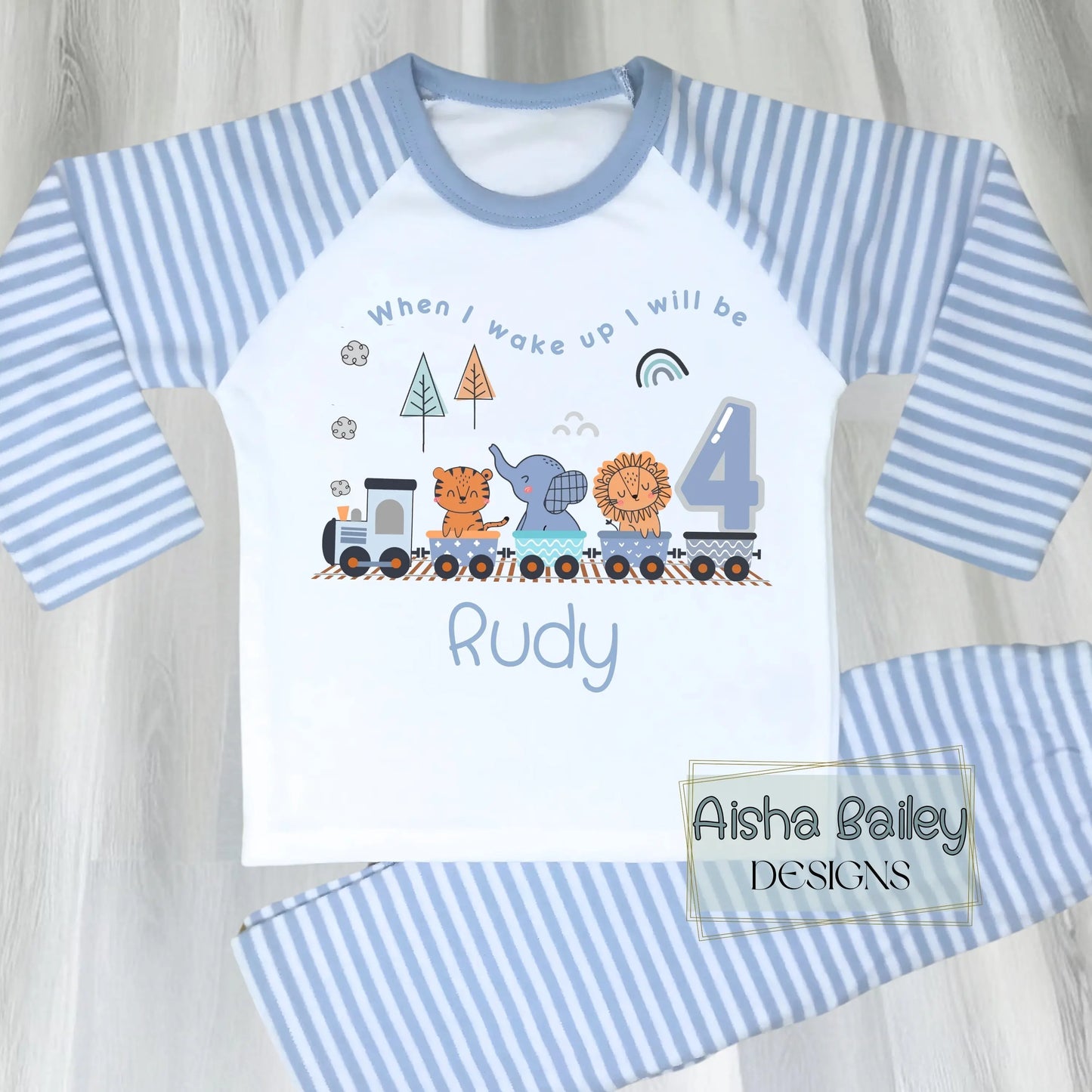 Personalised Safari birthday pyjamas with animal train design, custom name and age for boys