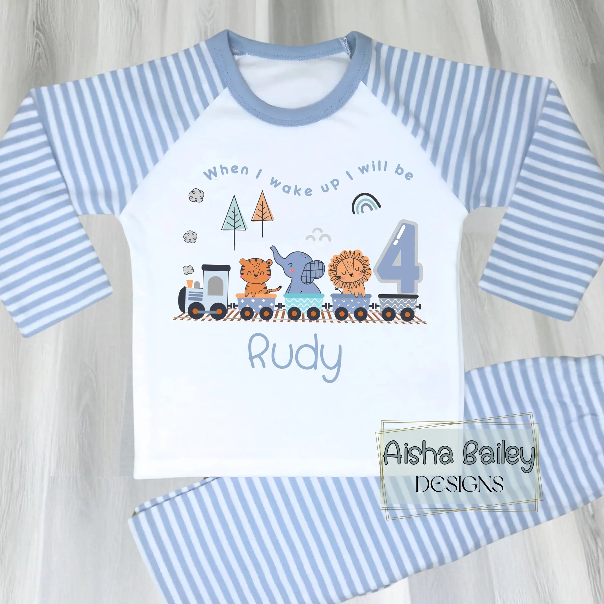 Personalised Safari birthday pyjamas with animal train design, custom name and age for boys