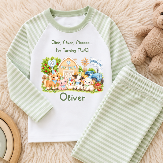 Personalised Farm Animal Birthday Pyjamas with cute watercolour farm animals, blue tractor, child's name and age. Sage green, beige or baby blue stripes.