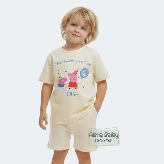 Personalised Peppa and George Pig Birthday Pyjamas for Boys with custom name and age, featuring birthday number  on white short set