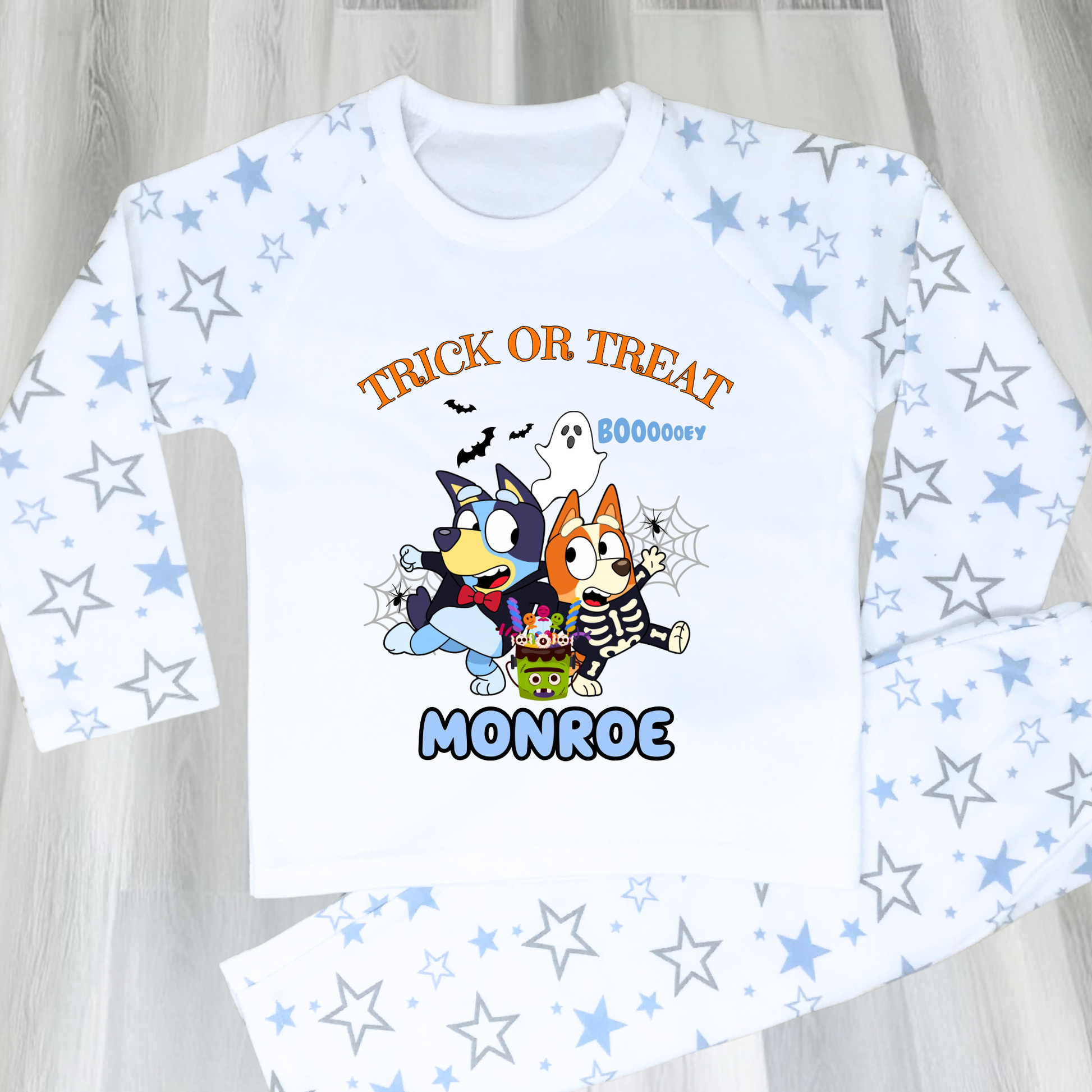 Boys personalised Bluey and Bingo Halloween pyjamas with name print and cute spooky design