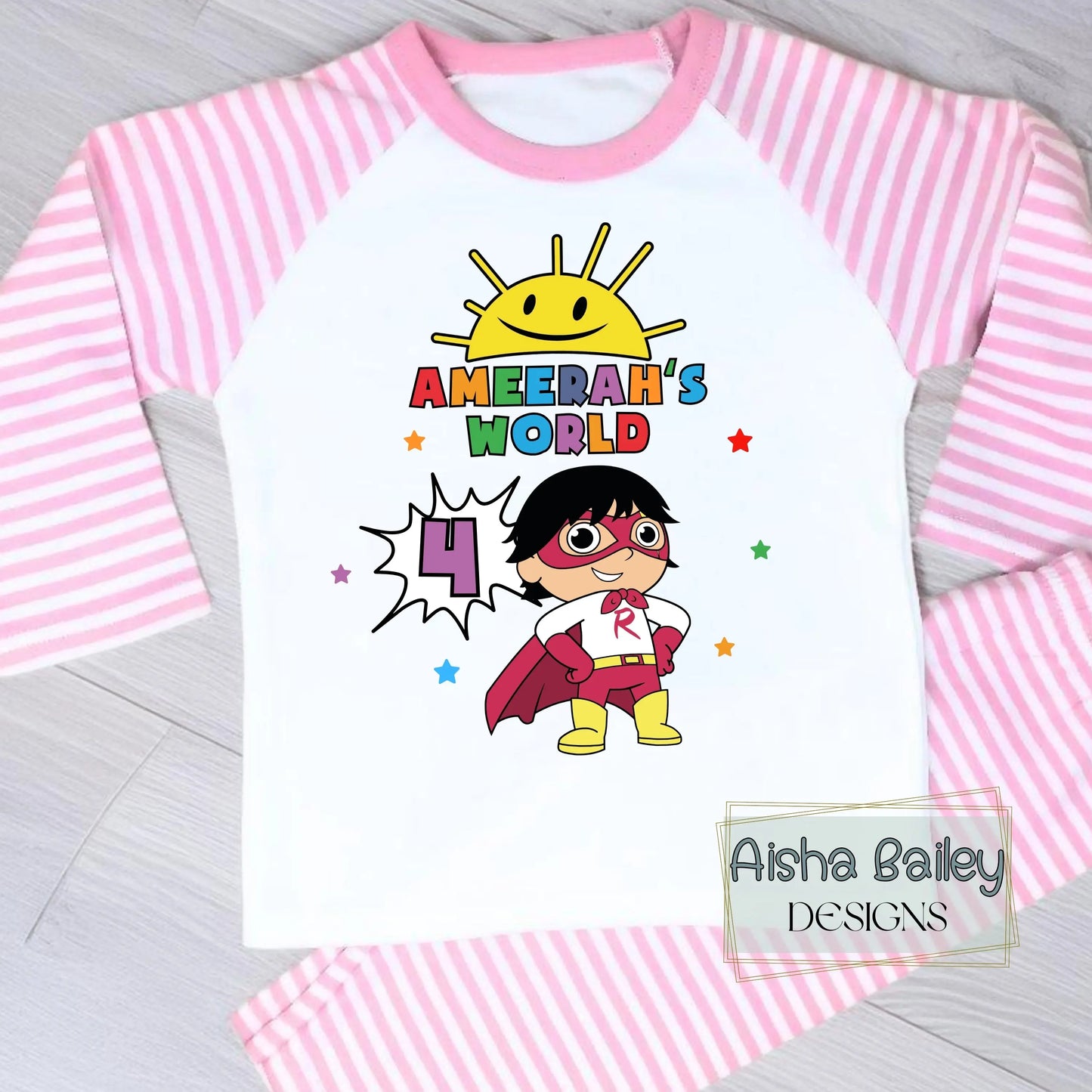 Ryan's World personalised birthday pyjamas for girls with colourful superhero design