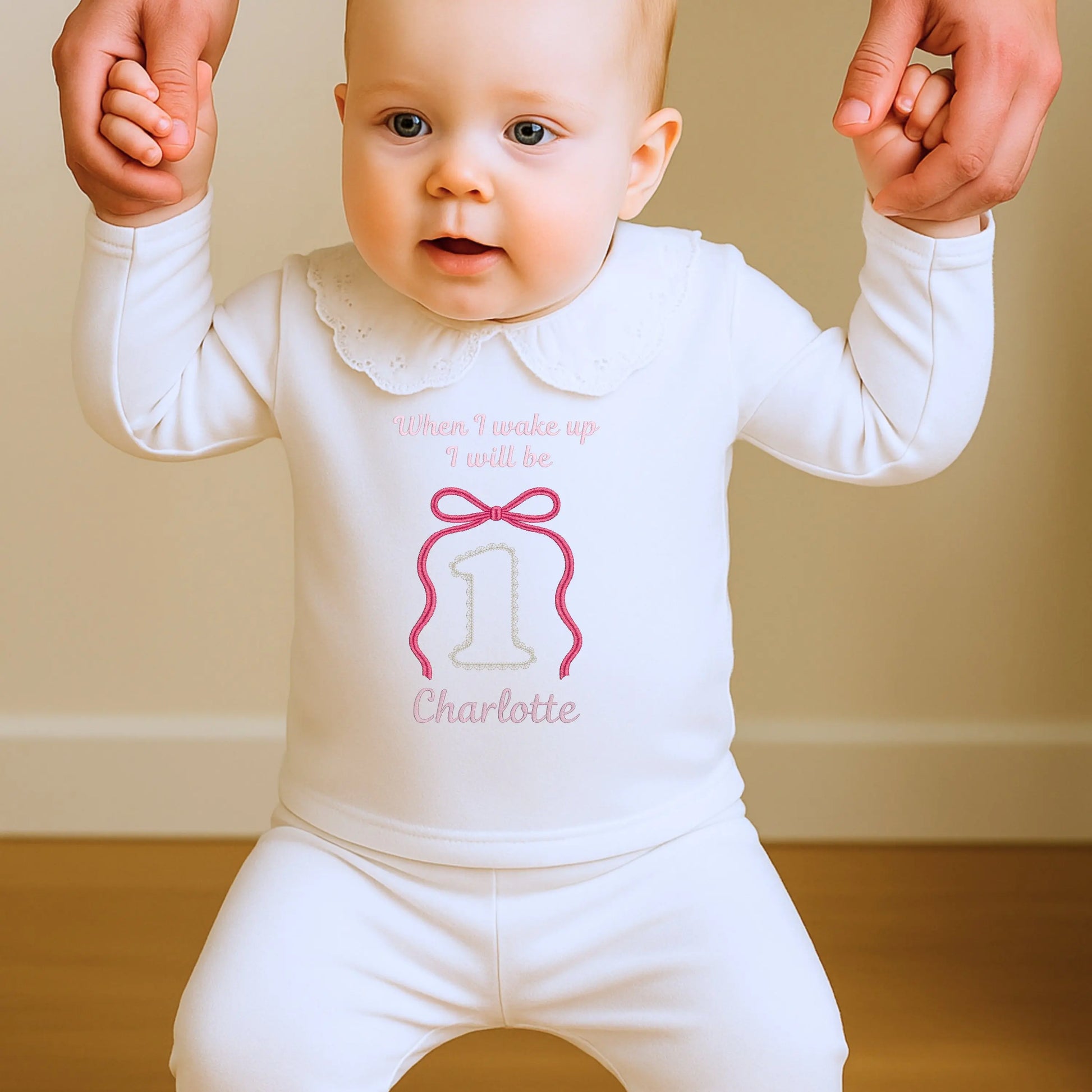 Bow birthday pyjamas for girls with embroidered bow and gold lace stitch birthday number