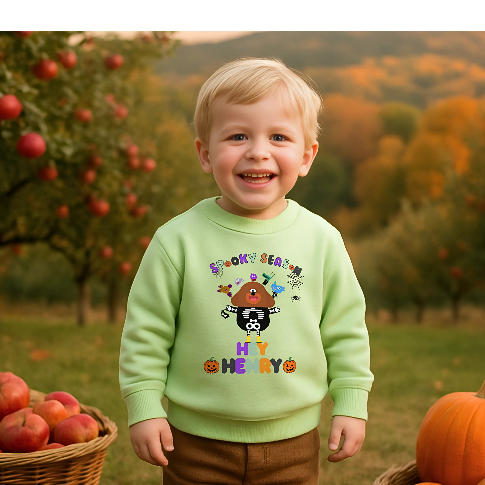 Child wearing personalised Halloween sweatshirt with trick-or-treat, Spooky Season design and custom name custom name