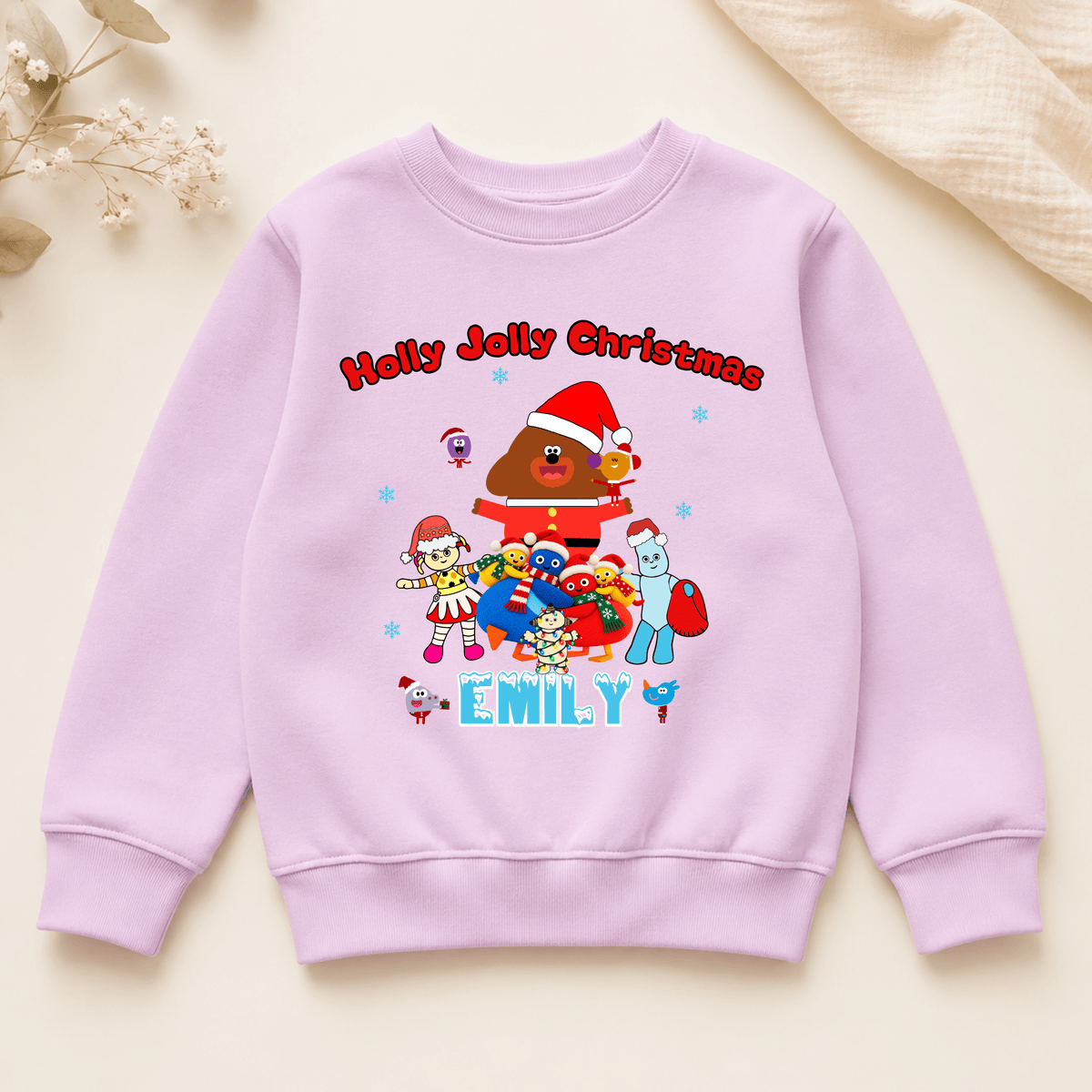 Personalised CBeebies Christmas Jumper for kids featuring festive CBeebies-inspired characters and a custom name, perfect for Christmas.