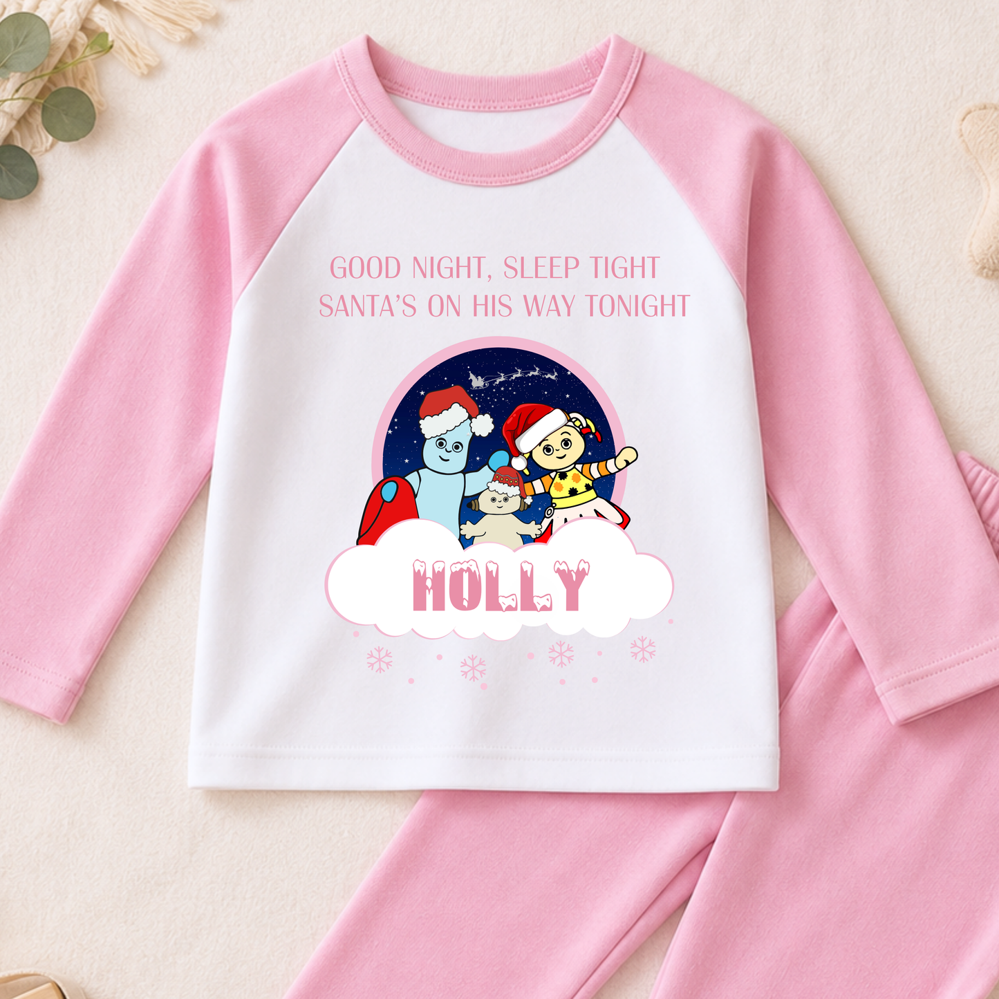 Girls Christmas Pyjamas personalised with name, featuring In the Night Garden characters Igglepiggle, Upsy Daisy and Makka Pakka in a festive design.