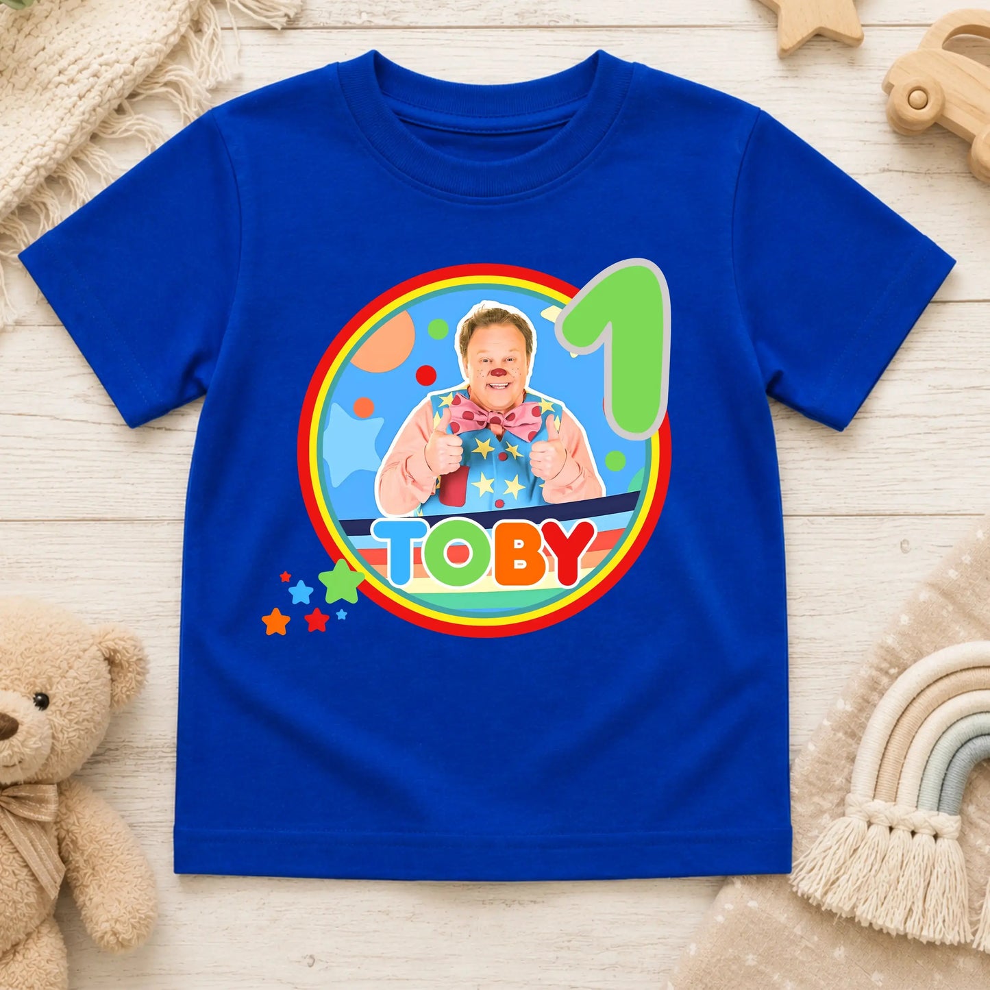 Personalised Mr Tumble birthday T-shirt for boys featuring a custom name and age with a colourful Mr Tumble-inspired design, perfect for birthday parties, cake smash photos, nursery celebrations and special birthday memories.