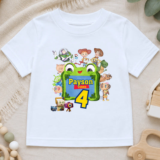 Personalised Toy Story birthday T-shirt for boys featuring custom name and age with colourful Toy Story-inspired characters including Buzz, Woody and friends, perfect for a birthday party outfit, cake smash and birthday photos.
