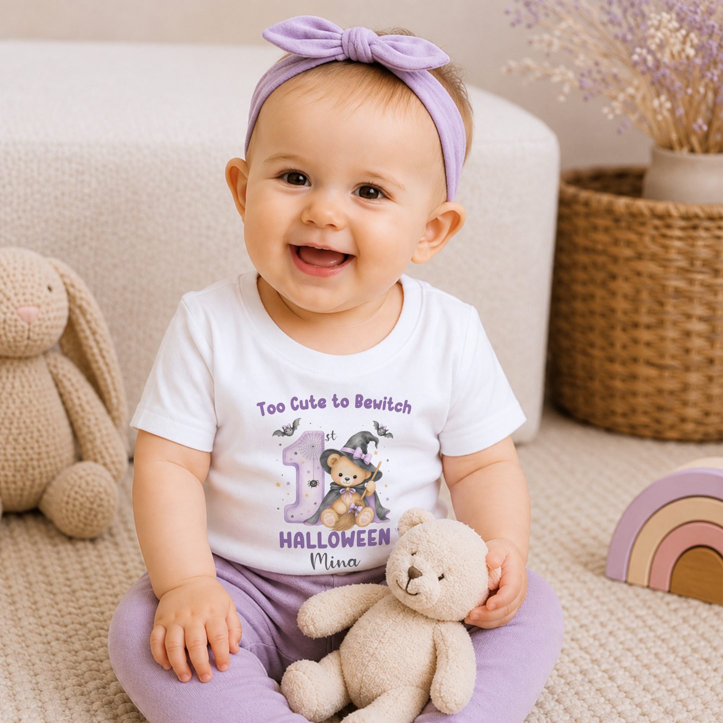 Personalised First Halloween Baby Outfit: Baby’s First Halloween personalised baby girl bodysuit with name, teddy bear witch, bats and first Halloween design.