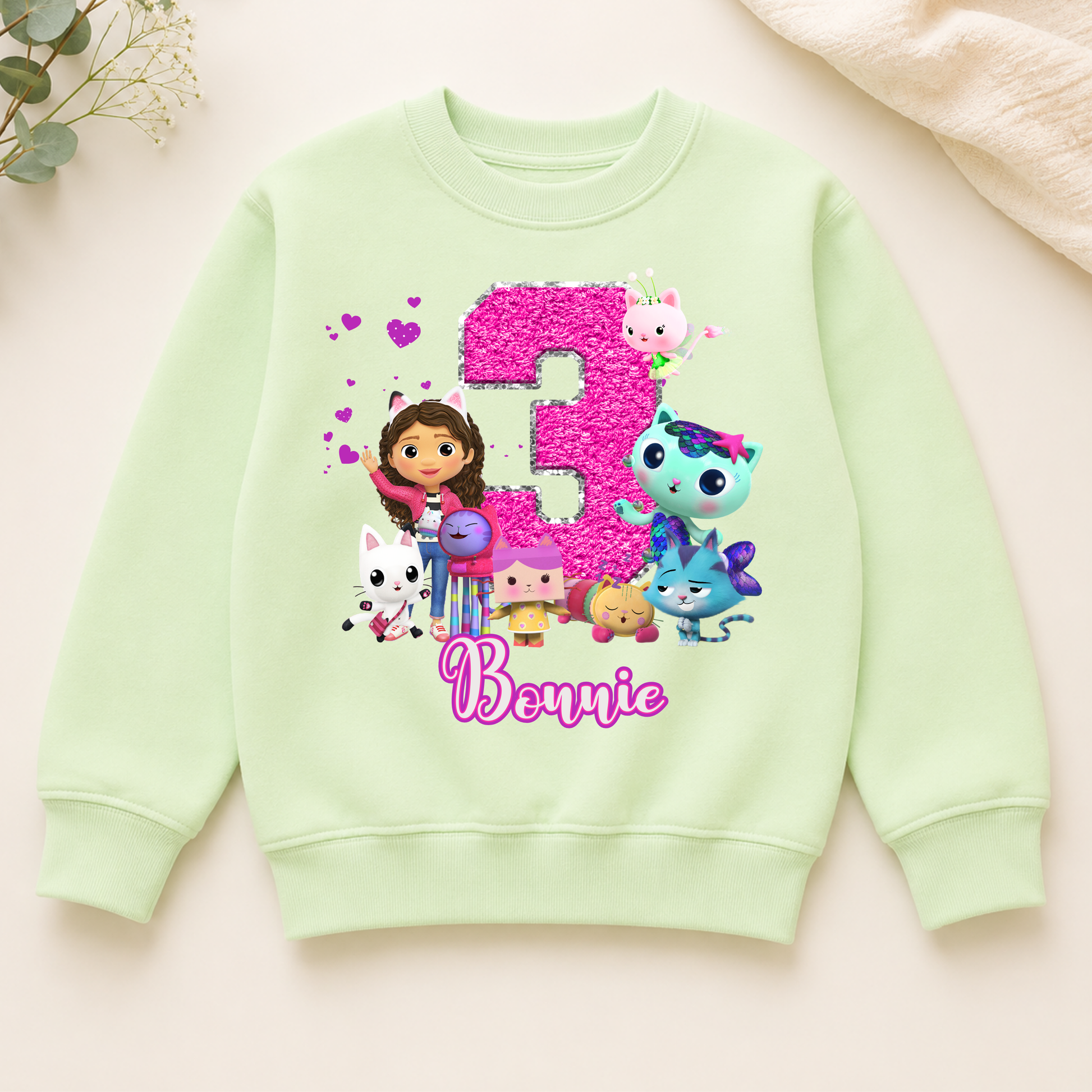 Personalised Gabby's Dollhouse Birthday Sweatshirt for Girls: A custom name and age sweatshirt for a girl's birthday Gabby's Dollhouse themed