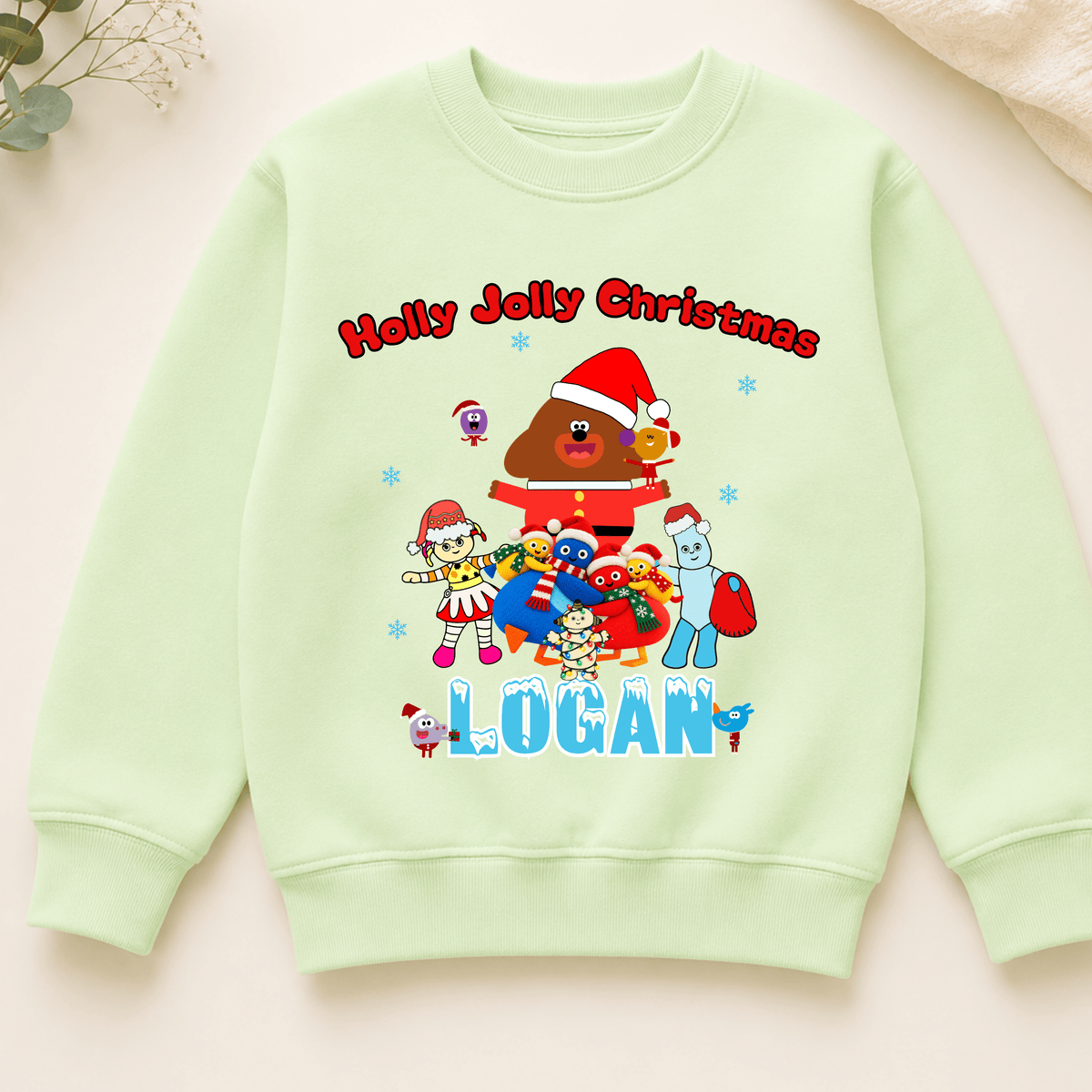 Personalised CBeebies Christmas Jumper for kids featuring festive CBeebies-inspired characters and a custom name, perfect for Christmas.