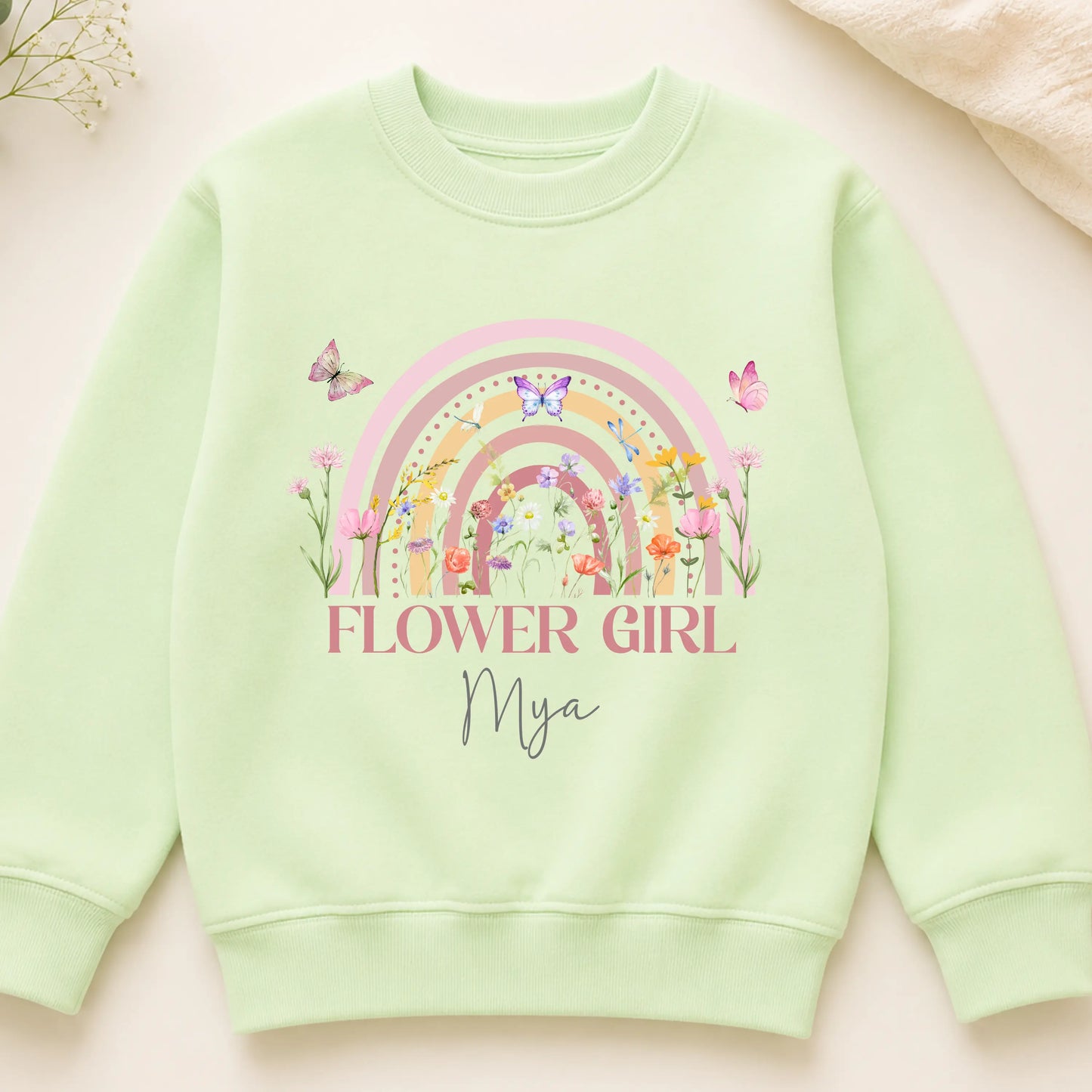 Personalised flower girl T-Shirt or sweatshirt with boho rainbow floral design, butterflies, custom name, and wedding role for children’s wedding outfits.