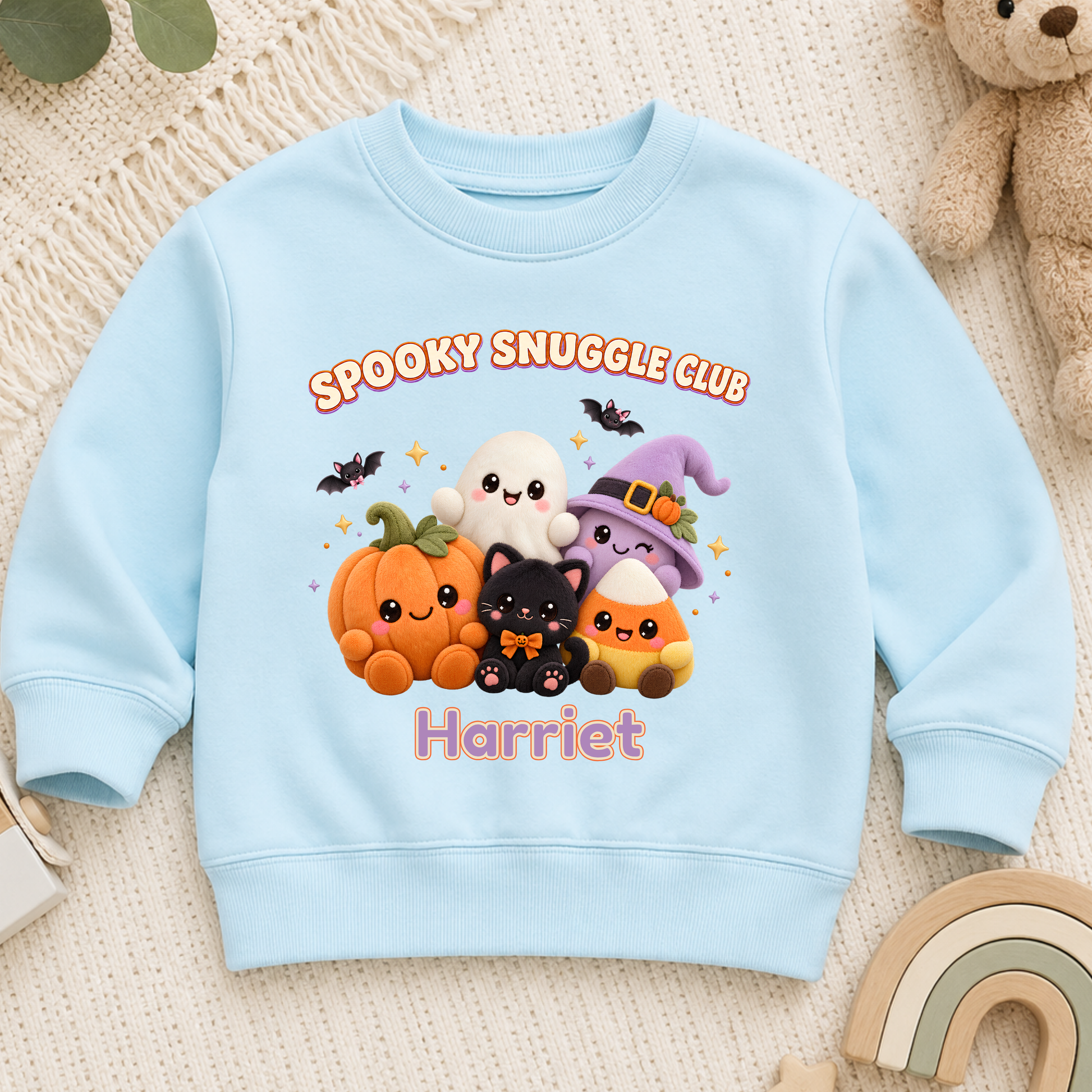 Personalised Halloween Sweatshirt for Kids with kawaii plush pumpkin, ghost, witch, black cat and candy corn Spooky Snuggle Club design.