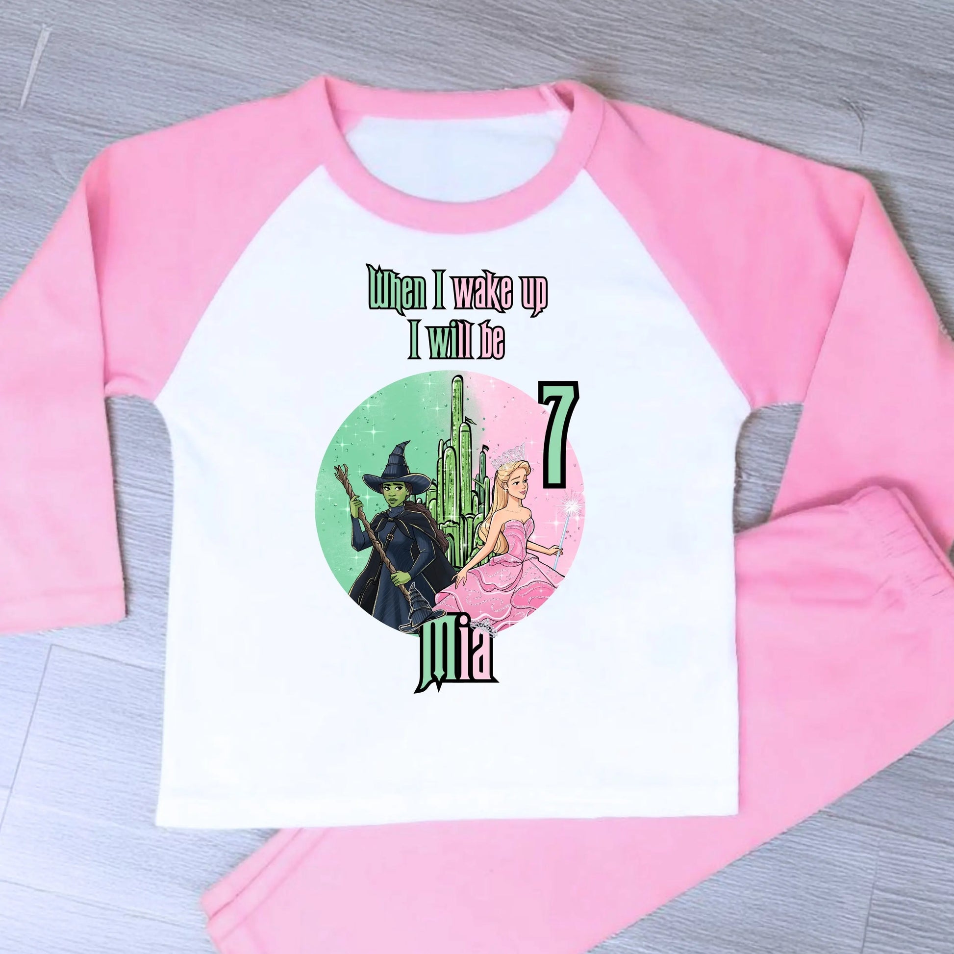 Pink Wicked Birthday Pyjamas for Girls with custom name and age featuring magical character design.