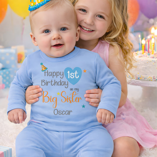 Personalised sibling birthday clothing featuring big sister first birthday pyjamas with custom name, perfect for matching sibling birthday outfits.