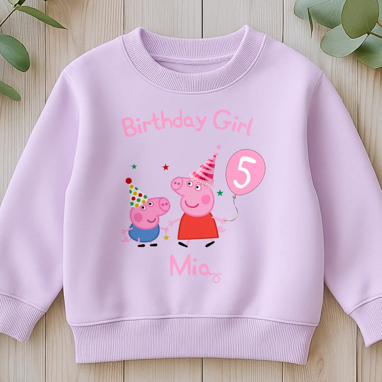 Peppa and George pig birthday sweatshirt: Child wearing a personalised Peppa and George white sweatshirt with 'Birthday Girl' and her custom age and name, standing against a light background.